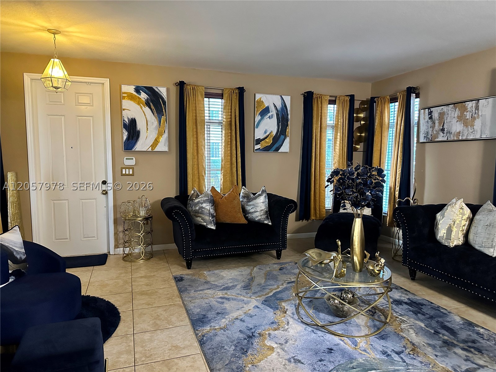 Spacious single-family home located in the Mandarin Lakes community, featuring a beautiful lake view and situated on one of the largest lots in the neighborhood. The functional floor plan includes a full bedroom and full bathroom on the first floor, offering flexibility for guests, a private office, or a variety of lifestyle needs. The open living and dining areas flow seamlessly into the kitchen, creating a comfortable space for everyday living and entertaining. Upstairs, the spacious primary suite and well-proportioned secondary bedrooms provide ample living space. The oversized backyard offers endless possibilities to enjoy the lake views, outdoor living, and future enhancements. Conveniently located near shopping, dining, parks, major highways, Florida's Turnpike, and the Florida Keys. A wonderful opportunity to own a home with exceptional space, a premium homesite, and a desirable South Miami-Dade location.