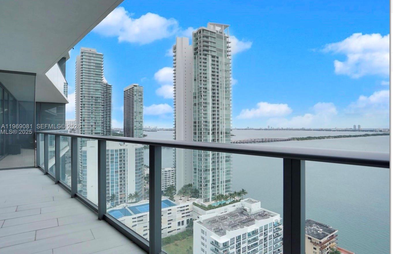 Due to tenant moving out - next showing is on March 20th at 2pm-3pm. Please send showing request. High-floor corner residence at Icon Bay – Unit 2102 offers breathtaking direct bay and skyline views through floor-to-ceiling glass and an expansive terrace. This 1BD/1.5BA plus open den floor plan features porcelain flooring throughout, an open-concept kitchen with Italian cabinetry, premium stainless-steel appliances, stone countertops, and a spacious island ideal for entertaining. 

Icon Bay is a luxury waterfront building in the heart of Edgewater offering resort-style amenities: bayfront infinity-edge pool, full-service spa with sauna and steam room, state-of-the-art fitness center, theater room, club lounge, tennis courts, 24-hour concierge, valet, and security. Prime location just minutes from Wynwood, Midtown, Design District, and Miami Beach.