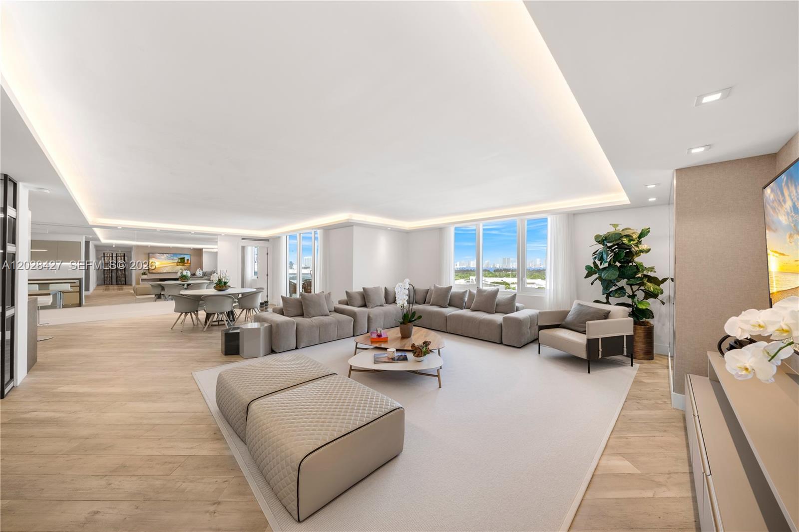 Experience beachfront living in this extraordinary residence at the iconic Roney Palace and 1 Hotel South Beach. Spanning approximately 2,480 SF, this one-of-a-kind home combines three units into a seamless 3-bedroom, 3-bath masterpiece designed by renowned Italian designer Rafael Tierni. Offered fully furnished, the residence showcases exceptional craftsmanship, featuring designer Artefacto furnishings, custom Ornare cabinetry and closets, a sophisticated entertaining bar, Dekton countertops, and Italian porcelain wood-look flooring. The gourmet Boffi kitchen is appointed with elegant marble countertops, premium Miele appliances, and sleek custom cabinetry, creating the perfect setting for both everyday living and entertaining. Each spacious bedroom offers king-sized accommodations and spa-inspired baths. All furnishings are included, providing a truly turnkey opportunity. Residents enjoy exclusive access to the world-class amenities of the 1 Hotel, including oceanfront pools, private beach service, fitness center, award-winning restaurants, 24-hour valet, concierge services, and resort-style living in the heart of South Beach. Includes 3 valet parking spaces and in-unit laundry.