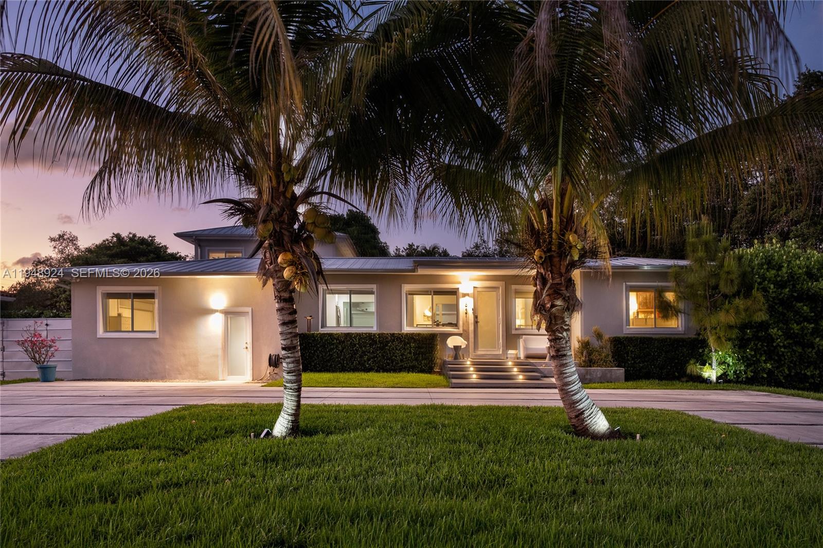 Modern, move-in ready private oasis on an oversized corner lot in Biscayne Park. Spacious 5-bedroom, 5-bath home designed for today’s lifestyle—comfort, flexibility, entertaining, and work-from-home ease. Fully fenced turf backyard offers privacy and space, with a large pool, covered patio, outdoor kitchen, and pool bath for seamless indoor-outdoor living. Layout features four bedrooms on the first floor and a private primary suite on the second level with spa bath, soaking tub, separate shower, water closet, walk-in closet, and space for office, gym, or nursery. Includes formal living room, family room overlooking the pool, and eat-in kitchen with ample storage. Additional features: impact windows, updated plumbing and electrical, natural gas, generator, indoor laundry, storage room, and workshop with potential for guest or staff quarters. Near parks, gyms, and top private schools including Miami Country Day School, St. Rose of Lima Catholic School, Montessori School of Miami Shores, and The Cushman School. Biscayne Park remains a true gem. Images may be virtually staged and/or digitally enhanced (furniture, colors, fixtures, landscaping) for illustrative purposes only.