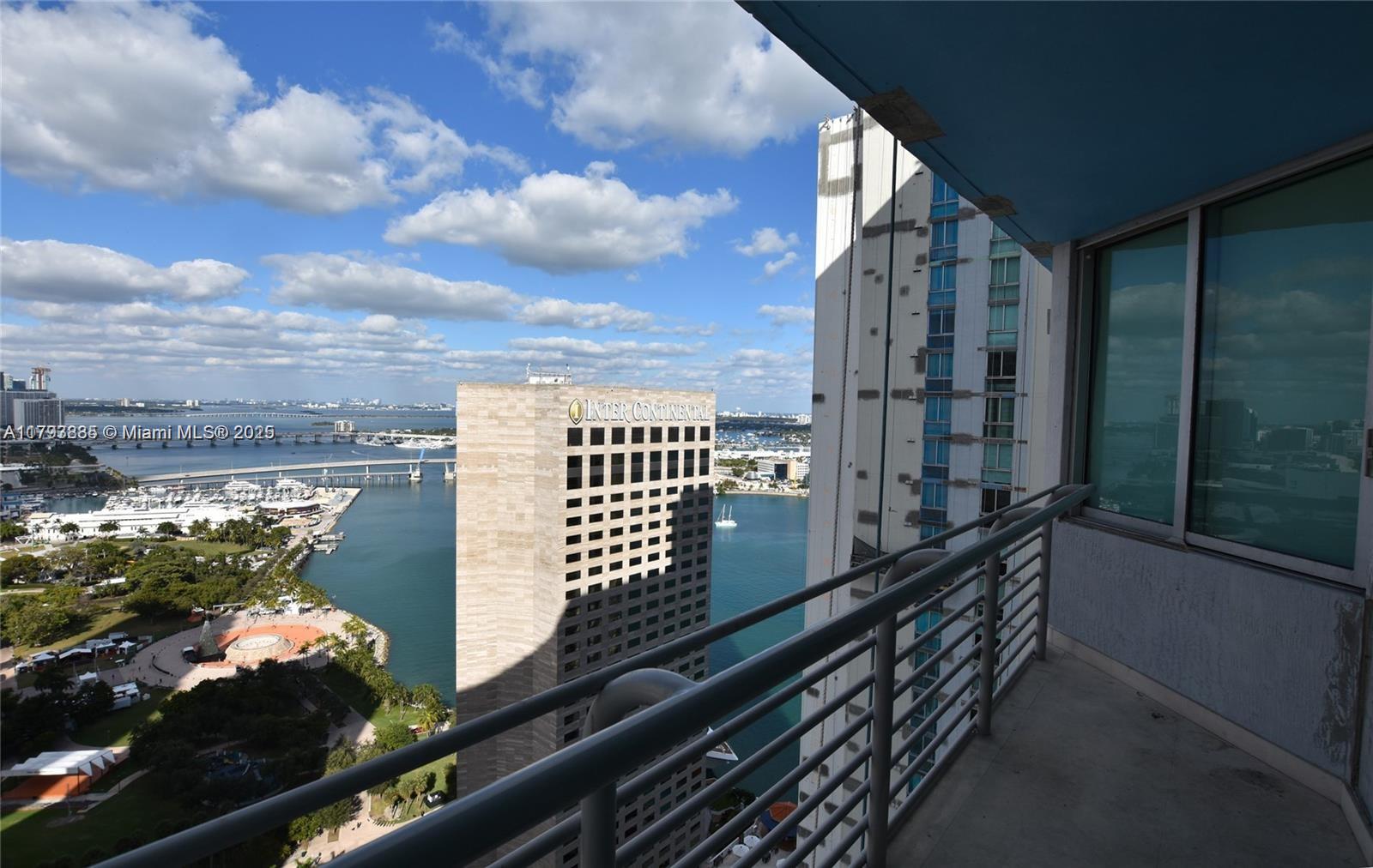 Great location! Magnificent water and city views! Split bedroom plan. Open kitchen with granite countertops and SS appliances. Marble floor in living/dining and wood floors in the bedrooms. Great amenities including resort style pool, fitness center, jacuzzi, party room, convenience store, concierge and valet. Close distance to best shopping, restaurants and entertainment.