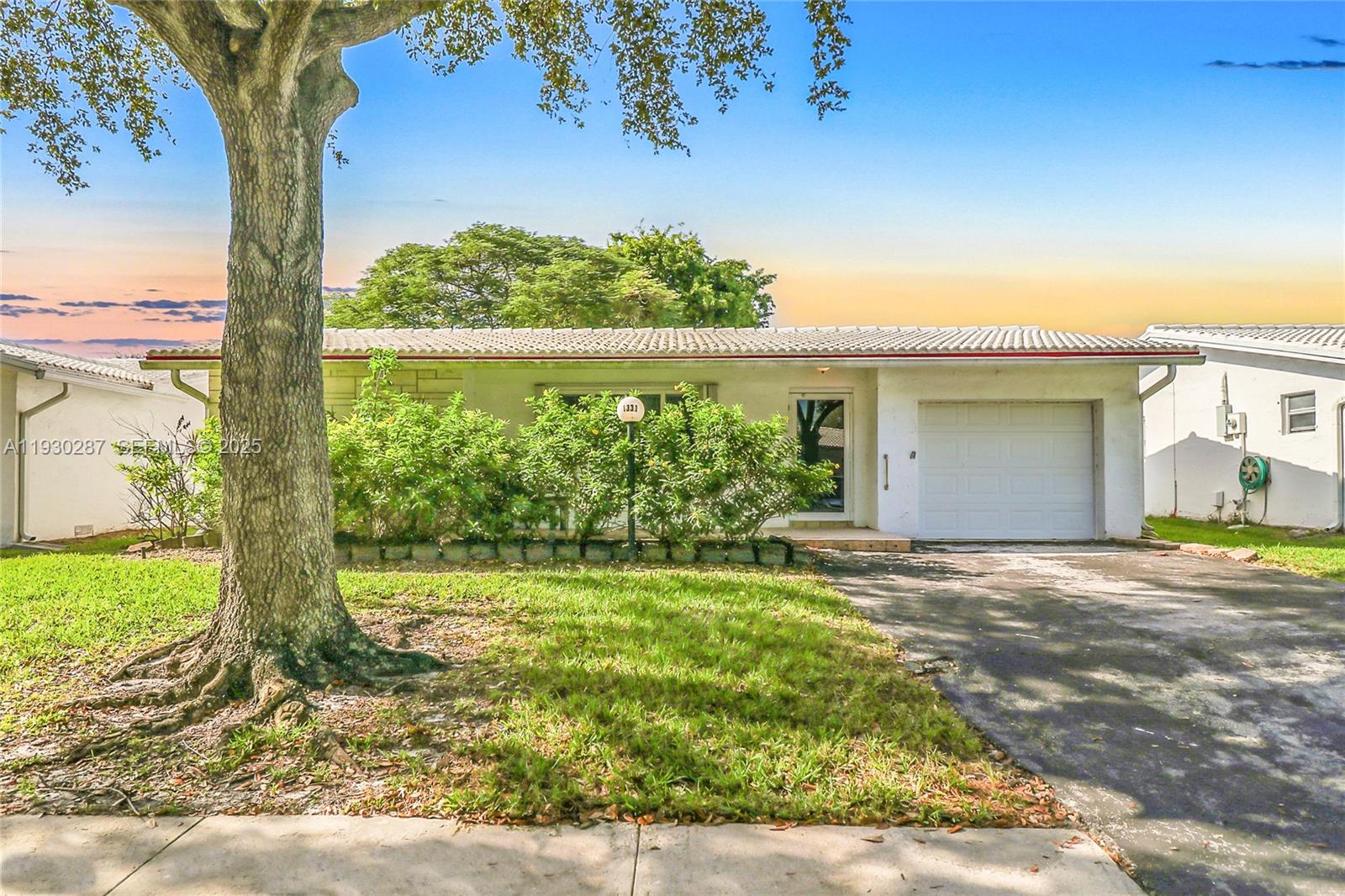Lakeview Model at highly sought after 55+ community Lauderdale West. Bring your own vision and update this home how you desire!  Just a few doors down from all the amenities, home features all hurricane impact windows, split floor plan, extra area for office+dining+family room setup in addition to main living area and breakfast space, screened porch. Both bedrooms have en suite baths & walk in closets. Assoc fee includes: Fiber optic HDTV & internet, community bus at your doorstep, roof repair & replacement, painting exterior of home, clubhouse activities  + professional shows, fitness center, 2 pools, tennis courts, pool tables, ping pong, card rooms,  library, party room. Close to Plantation and Sunrise shopping, major expressways, dining, more. 720+ credit score & 20%. down payment req. All information deemed accurate, but not warranted by agent or owner.