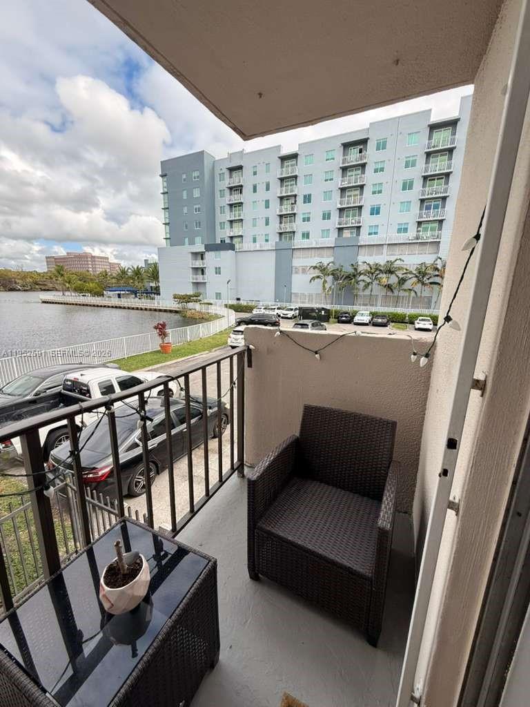 MUST SEE! Beautiful and spacious 2-bedroom, 2-bathroom condo with stunning lake views, located on the first floor. This well-maintained unit features an open kitchen, updated bathrooms, impact windows, washer and dryer inside the unit, and a large balcony overlooking the lake. The master bedroom includes a walk-in closet.

Located in a gated community with security cameras, pool, elevators, and laundry rooms on every floor. Prime location minutes from Miami International Airport, major highways, shopping, and restaurants. Excellent opportunity for investors or first-time buyers—schedule your showing today!