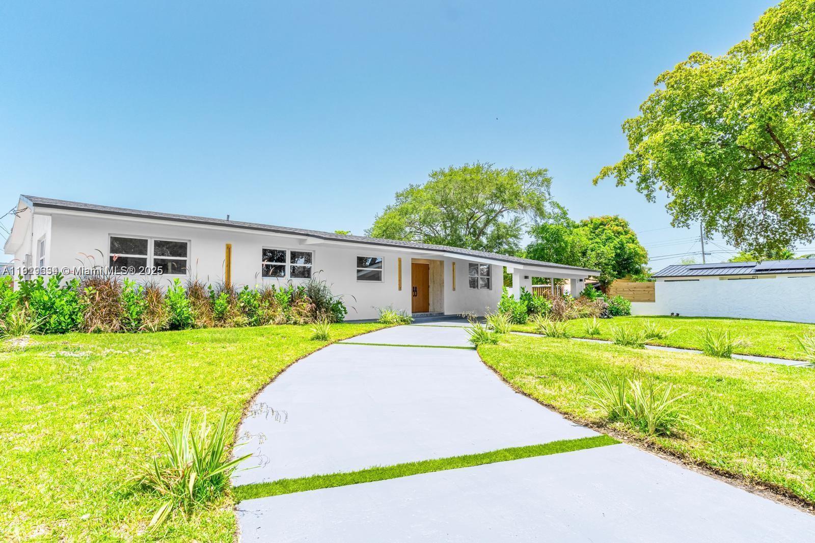 Discover this stunning, fully renovated 4-bedroom, 3-bathroom home offering modern luxury and everyday comfort. This home has been completely upgraded with all-new electrical, plumbing, HVAC, roof, impact windows, doors, and flooring. The chef’s kitchen features extensive cabinetry, custom polished-concrete design, and expansive countertops ideal for cooking, hosting, and entertaining. The open, thoughtful layout provides exceptional flow throughout.

Enjoy a spacious front and backyard with a pool, gazebo, and concrete wrap-around fence for privacy and security. A large circular driveway enhances curb appeal. Situated on a desirable corner lot, this property delivers style, quality, and total peace of mind.