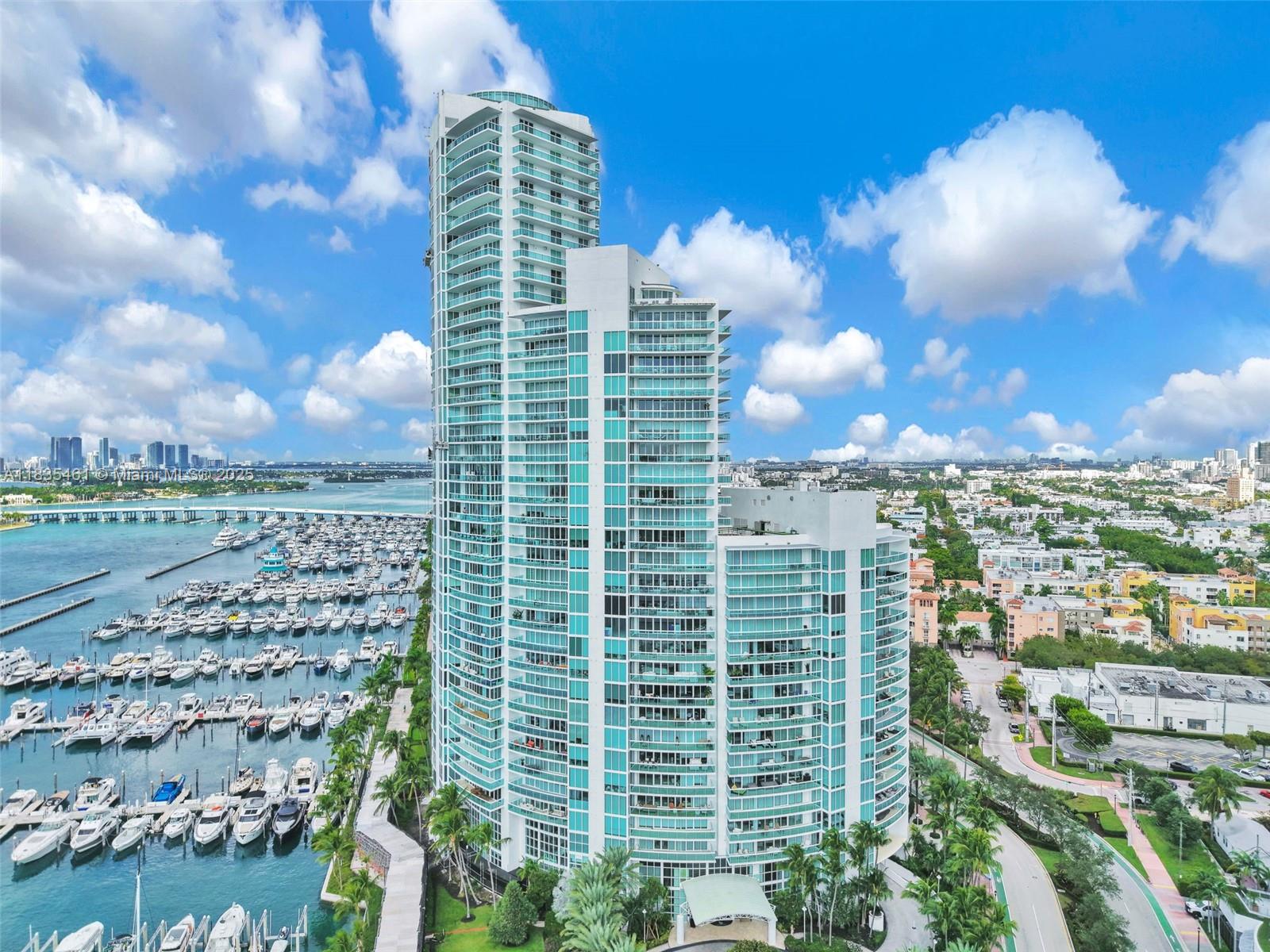 Experience the pinnacle of luxury living in this stunning penthouse at Murano at Portofino, located in the exclusive South of Fifth neighborhood. Surrounded by white-sand beaches, turquoise waters, and lush parks, this serene enclave offers top dining, cozy cafés, and premier social clubs. Fully renovated with high-end finishes, the residence features a Nolte European kitchen, smart home technology, custom carpentry, and electric shades. Enjoy breathtaking views of the Intracoastal, Miami skyline, marina, and ocean. Amenities include a beach club, two pools, tennis courts, and a fitness center (one pool and one tennis court currently under renovation).
