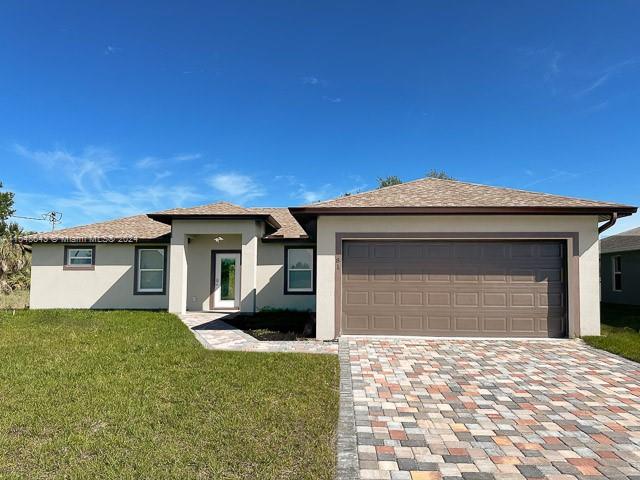 2024 New Construction. 4 bedrooms and 2 full baths in this 1,642 SqFt under air, a total of 2,253 SqFt. The spacious open floor plan seamlessly blends style and functionality. Tailored to meet the needs of both first-time home buyers and savvy investors. The spacious open floor plan is great for entertaining. Kitchen comes with stainless steel appliances, solid real-wood cabinetry, and exquisite quartz countertops. The master bedroom offers a large walk-in closet, an attached marble sink, and a spacious walk-in shower, tankless water heater, indoor laundry with washer-dryer hookups, impact windows and doors for security, and a finished garage with a paved driveway. Home comes with 4 exterior surveillance cameras, ready to be connected by your preferred cable provider.