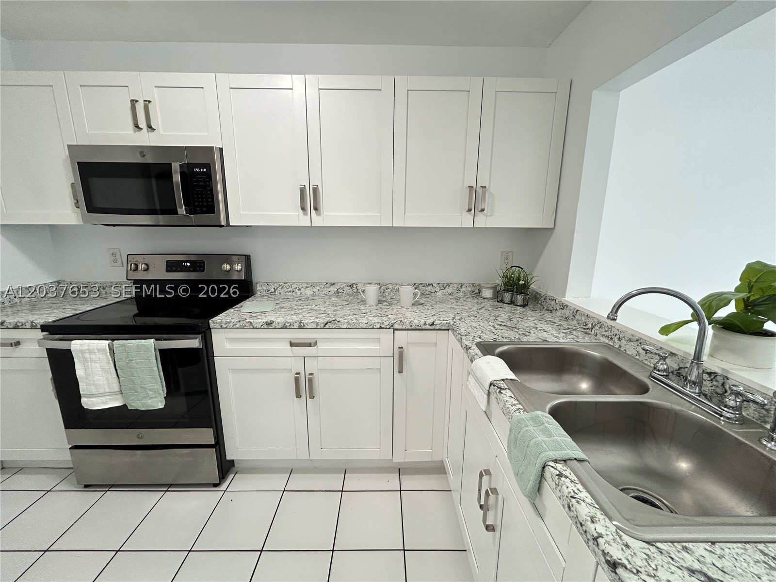 REDUCED DEPOSIT FOR QUALIFIED TENANTS! YOU'VE FOUND YOUR NEW CONDO WITH WASHER/DRYER! Beautiful second-floor, 2-bedroom, and 2-bathroom corner condo in the desirable community of Rozland Condominium with WASHER/DRYER! Features include a comfortable layout, tile throughout, a master bath with a walk-in shower, and spacious bedrooms. You'll enjoy easy access to shopping and privacy in this corner unit. Assigned parking space & PLENTY of parking! Community amenities include a children's playground and walking distance to Westwind Lakes Park with kids' playground, jogging paths, picnic areas & open field for games!! Close to Sunset Dr, great schools, restaurants, shopping & more! Hurry! Don't forget to watch Full Video Walk-Thru in Virtual Tour! Sorry, no pets for tenants as per association.