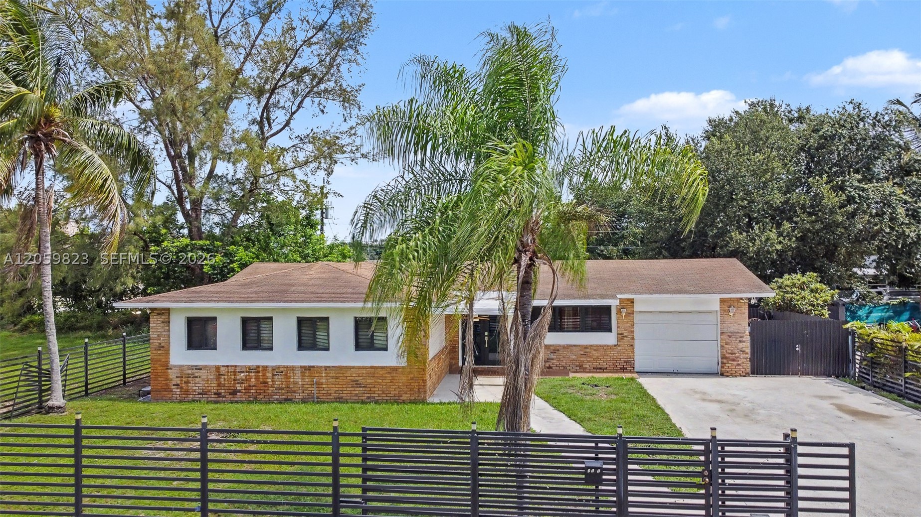 Opportunity to Update this home and make it yours.  All impact windows through out the house is a huge plus.  Big bedrooms and spacious Living room. The square footage is there, imagine all possibilities and transform this amazing gem.