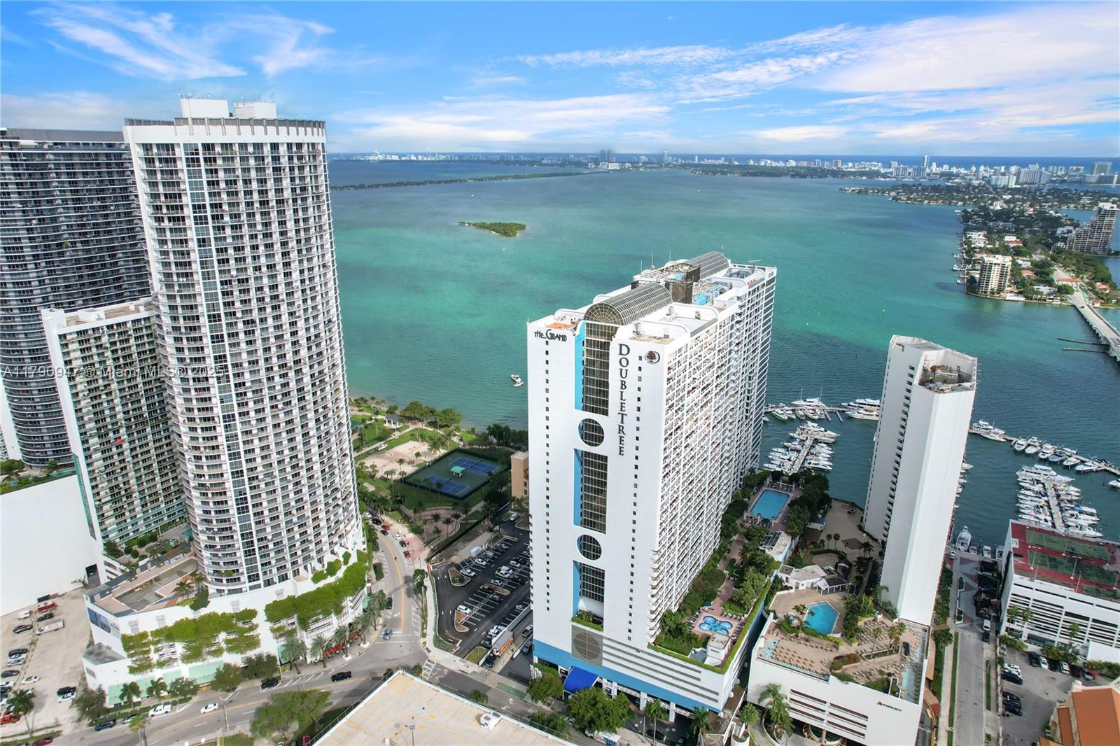 Enjoy panoramic bay and city views from this expansive 1-bedroom, 1.5-bath residence perched on a high floor at The Grand. A spacious layout opens to a large balcony, perfect for soaking in Miami’s vibrant skyline. The open-concept design features a walk-in closet, impact glass doors, and a primary bath with separate tub, shower, and bidet. Resort-style amenities include a bayfront pool, state-of-the-art fitness center, sauna, and on-site dining and retail. Flexible rental options through hotel management offer income potential and convenience.