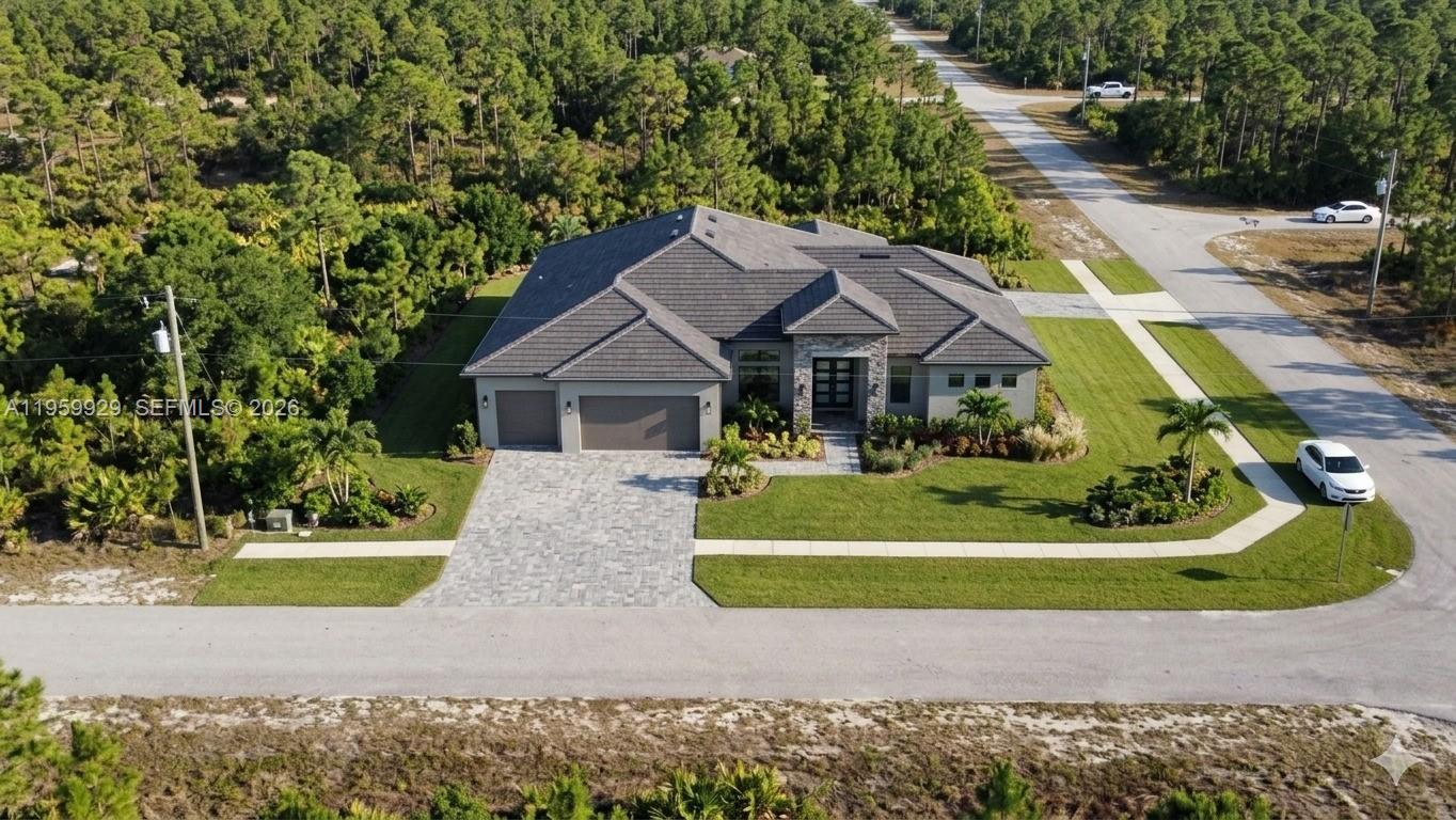 Discover an incredible opportunity to build your dream home on this spacious quarter-acre corner lot in Lehigh Acres! This prime location offers the perfect canvas for custom home builders, developers, or investors. The corner lot provides extra flexibility for parking RVs, ATVs, or boats—ideal for outdoor enthusiasts. Conveniently located just 10 minutes or less from major shopping centers, parks, and entertainment, this lot combines tranquility with accessibility. With its proximity to local amenities, this property is also a fantastic option for an Airbnb or cash-flowing investment. Don’t miss out on this versatile and promising opportunity!