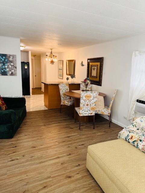 Stunning fully renovated 2-bedroom, 2-bathroom home featuring a unique layout with 2 kitchens, ideal for extended family or income potential. Bright living and dining areas plus a charming Florida room. Enjoy a private patio with beautiful lake views. Private parking included. Located in a secure, well-maintained community with security service. Move-in ready and perfect for homeowners or investors. Rare opportunity!