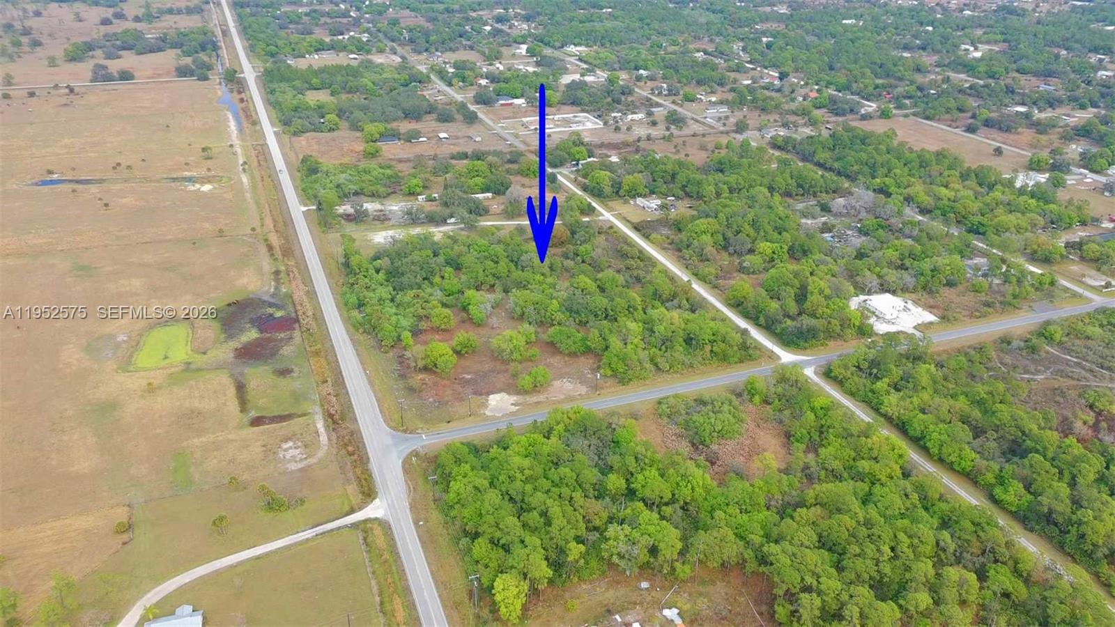 Exceptional 5-acre corner lot located in one of the most central and strategic areas of Montura Ranch, at the intersection of SR-833 and Hunting Club Road, the community's main thoroughfares. Currently zoned residential, it has high potential for rezoning to commercial use, especially given its frontage on SR-833, one of the streets with the greatest development potential in Montura.
The land is high, dry, and cleared, and features paved roads, a key characteristic for future projects. Finding a full five-acre lot in this location is extremely rare, making this a unique investment opportunity.
Its size, location, and potential make it ideal for multiple types of businesses, mixed-use developments, or long-term projects. This property offers great visibility, accessibility, and growth potential in an area where commercial opportunities are highly sought after.