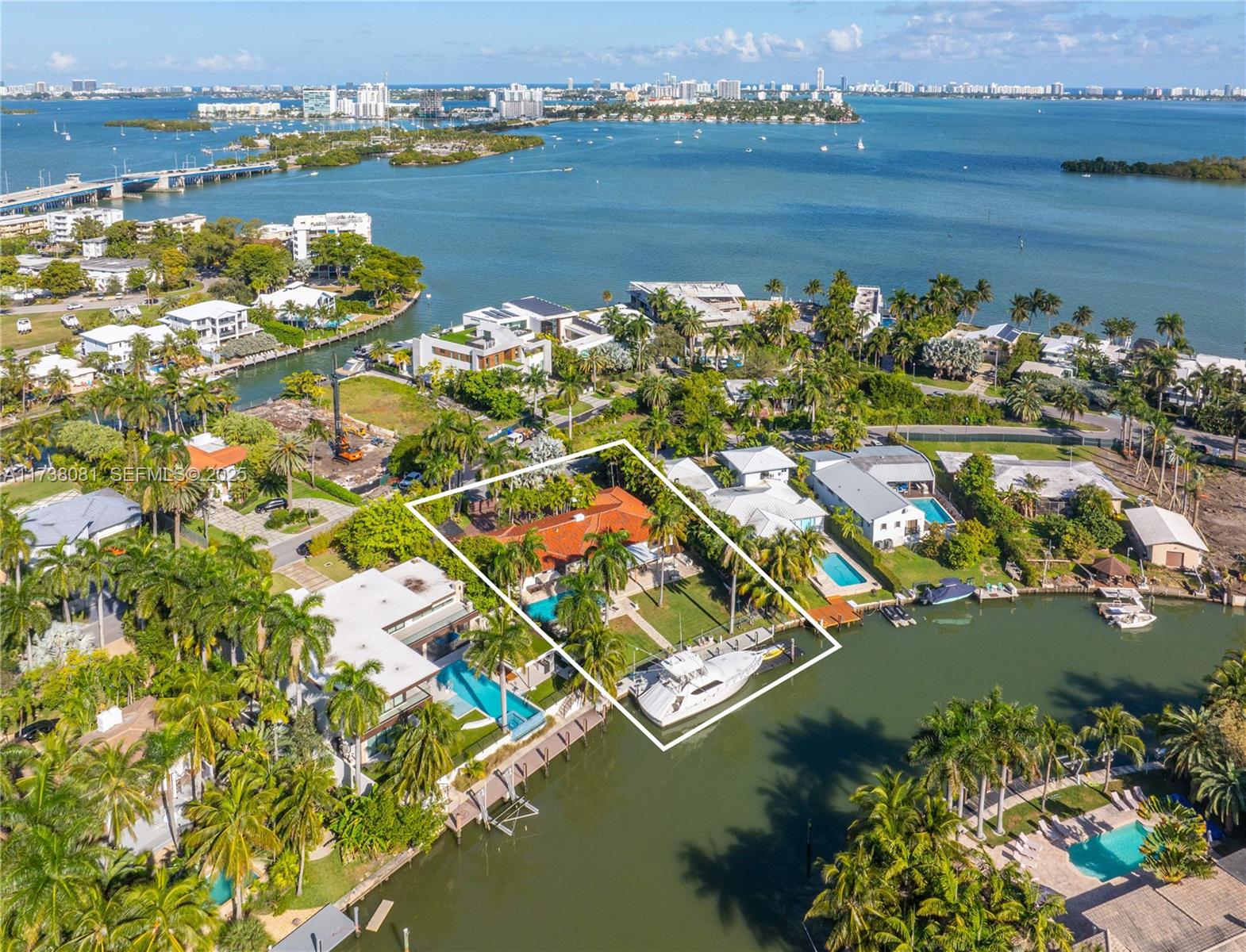 Rarely available waterfront beauty on double guard-gated Belle Meade Island! Nestled on a gated 17,418 SF double lot, this renovated residence offers 111' of protected water frontage, direct ocean access, no fixed bridges to the bay, and a 90' deep water dock. Inside, find spacious and sun-filled interiors, impact windows, a gourmet eat-in kitchen with Sub-Zero and Wolf appliances, remote shades, and custom lighting. The gorgeous backyard is perfect for entertaining with a stunning infinity pool, jacuzzi, covered patio, gazebo, and lush tropical landscaping. Complete with a 2-car garage, new roof, generator, and Smart Home technology. Premier location! Belle Meade is one of Miami's most sought-after gated communities with its own park and dog park.