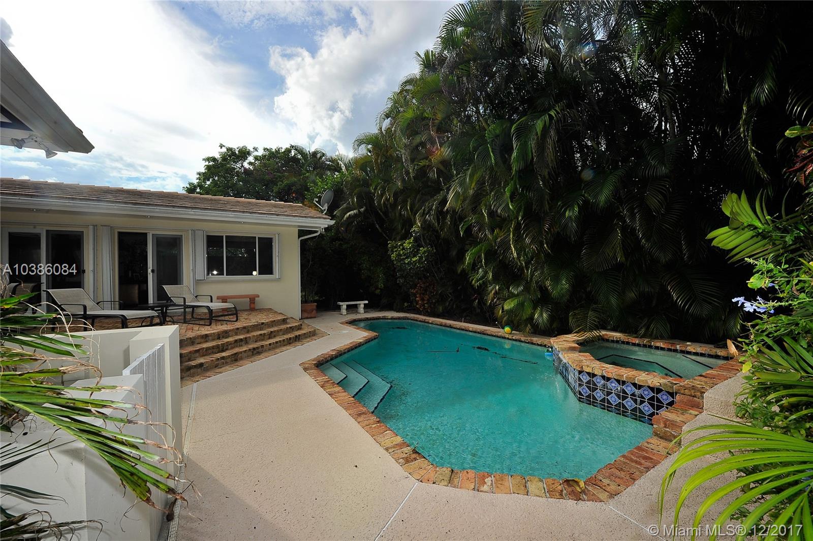 Lovely hm with functional floor plan in the heart of Coral Gables just a few blocks from UM, Fmal living and dining area. Updated open kitchen with wood cab/granite countertop. Lg family room with access through french doors to outdoor area. Heated pool/ jacuzzi w/ chicago brick flng. Built in gas BBQ, Lrg master bedroom & bath with jacuzzi. sep shower, dbl sink, bidet, & vanity. Hardwood floors throughout. Completely remodeled.