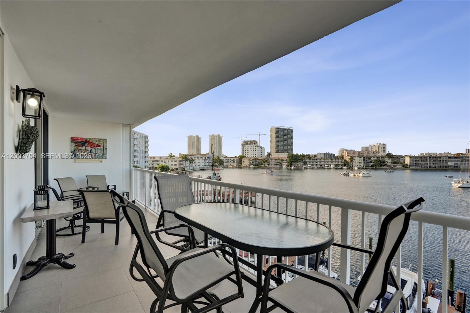 Magnificent 2-bedroom unit with breathtaking intracoastal views from a spacious balcony with sliding doors in both the master bedroom and living room,impact windows. fully furnished and tastefully decorated, featuring porcelain flooring throughout, open kitchen with granite countertops, second bedroom with Murphy bed, large deck extending to the water with BBQ area and seating to enjoy the sun, building offers a dock accommodating boats up to 55 ft (waiting list), excellent location close to the beach, grocery stores, and restaurants, 50-year certification completed
