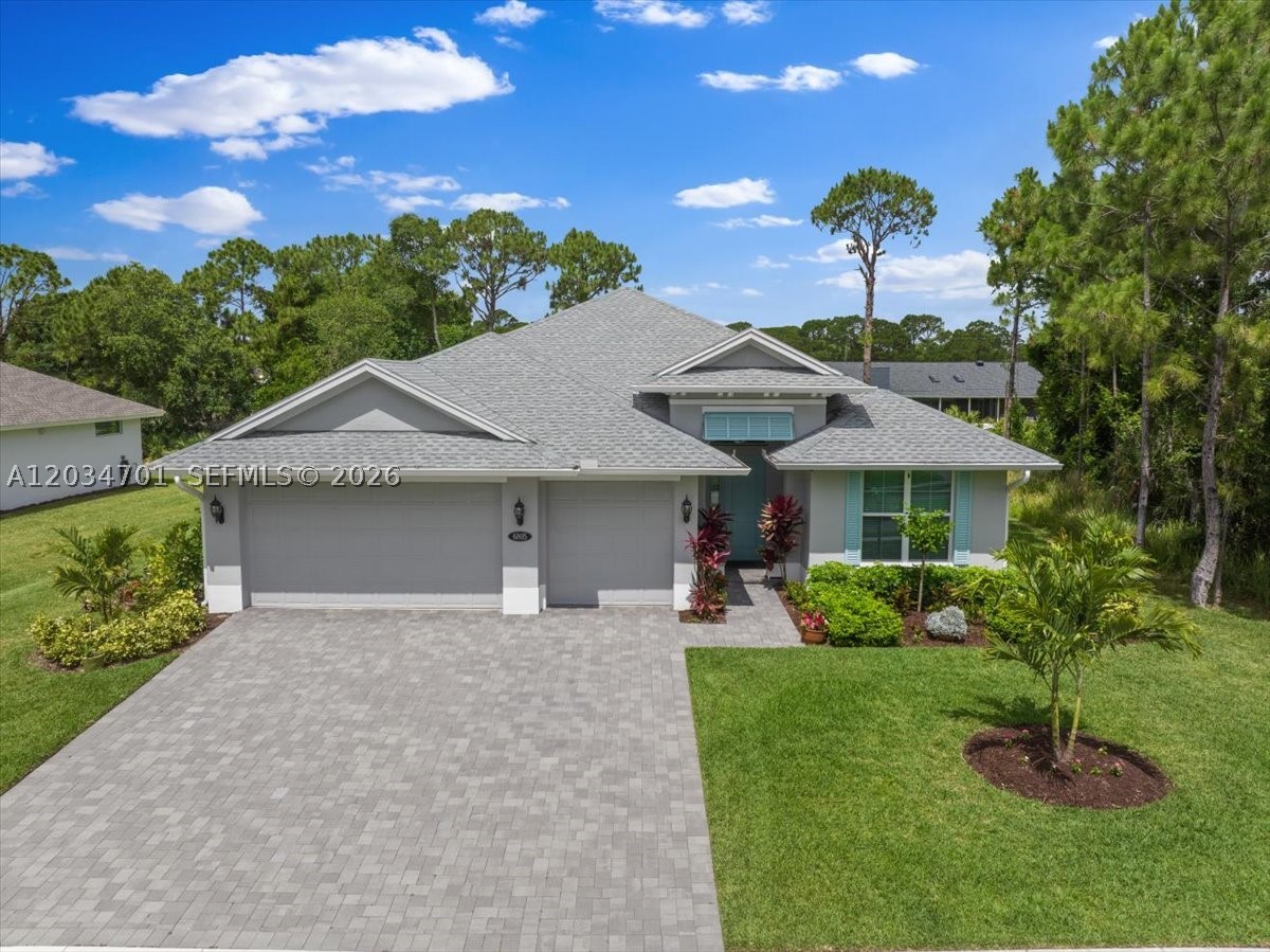 Priced to sell! Check out this stunning two-year-old home in the gated community of Crystal Falls which features 3 bedrooms, 3 bathrooms, den and 3 car garage with a new pool. Built by GHO, the Capistrano Grande model sits on a .3-acre lot, offering the perfect blend of elegance, privacy, and convenience — just a short drive to pristine beaches and premier shopping. Step inside and be immediately impressed by soaring coffered ceilings adorned with custom crown molding, setting the tone for the exceptional craftsmanship found throughout. The gourmet kitchen is a chef's dream, featuring 42" cabinets, a wall oven, modern designer hood, gleaming quartz countertops, and a stunning glass pantry door. Every window and door is fitted with impact glass, providing peace of mind and year-round.

The grand main suite is a true retreat, boasting two large walk-in closets and a spa-inspired bath complete with a rain shower head and built-in seat. A private en-suite with its own shower, seat, and niche offers ideal flexibility for guests or multi-generational living. Work from home in style in the elegant den with French doors, and enjoy the convenience of a large laundry room with abundant cabinetry and a utility sink. The outdoor living experience is simply spectacular. Huge sliders lead to a sprawling lanai featuring beautiful brick pavers. The crown jewel is the ten-month-old custom saltwater heated pool, complete with a dramatic waterfall and sun​​‌​​​​‌​‌​​​‌‌​​​‌‌‌​​‌​​‌‌​​​​ shelf.