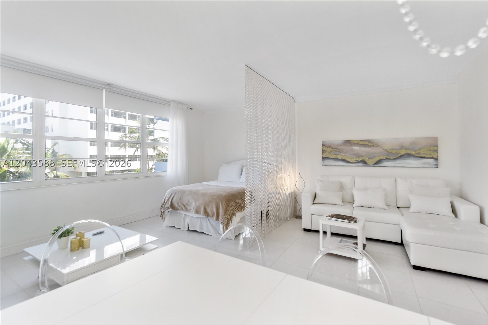 Charming studio with very nice view on the Lincoln rd palm trees in the high desirable Decoplage Condo, directly on the beach! The apartment is delightfully decorated and features  nice matte ceramic floor all over, alcove area divided from living room thru a nice crystal curtain dropping down from the ceiling, separated Kitchen with full appliances, bathtub/shower in the bathroom.
Amazing condo amenities, heated swimming pool and state of the art renovated gym between others.
Right to park 1 car thru valet parking, wifi and TV Cable included in the HOA payment.
Flexibility on the lease policy (30 days min) provides the best combination between investment and personal use. Special assessment of $226.40/mo thru March 3034 has to be assumed by buyer who will take advantage of the huge appreciation of the condo coming from the renovation of the hallways and port a cochere together with Lincoln rd beautification project, construction of Ritz Carlton Residences, new opening of many luxury hotels in Collins ave and Alo Yoga store.