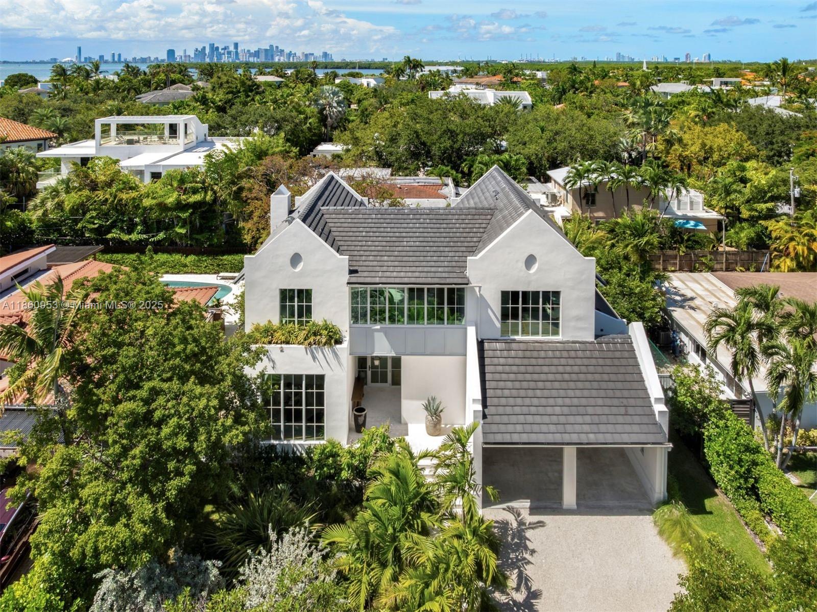 Turn-key custom home crafted by Duncan Heuser Design & Development, featuring a comprehensive interior design package by James Duncan Design. This must-see residence showcases classic architecture and timeless elegance. A curated selection of furniture is available for purchase separately.