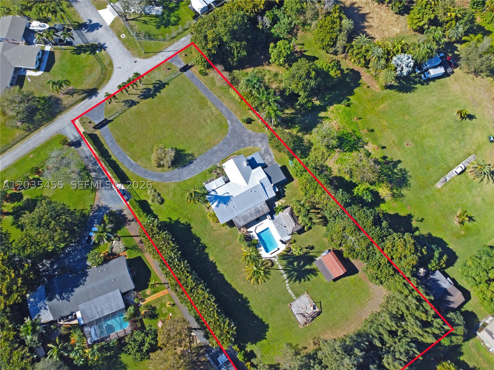 Rare dual-folio estate property totaling 1.51 acres in the heart of Southwest Ranches, offering an exceptional combination of privacy, usable land, flexibility, and long-term potential. Opportunities to acquire two combined folios with this level of acreage, versatility, and location are becoming increasingly rare.

The residence features 4 bedrooms, 3 bathrooms, a resort-style pool, tiki bar, fire pit, and additional 2-car carport, creating an ideal setting for both everyday living and entertaining.

Beyond the residence, the expansive 1.51-acre dual-folio site provides opportunities rarely found in today's market. The property offers abundant space for recreational vehicles, boats, hobbies, future improvements, or the creation of a private family compound, while maintaining the open lifestyle and privacy that define Southwest Ranches.

Ideally located just minutes from Weston, major highways, shopping, dining, and top-rated schools, this property combines the convenience of city access with the space, privacy, and estate character that make Southwest Ranches one of South Florida's most sought-after communities.