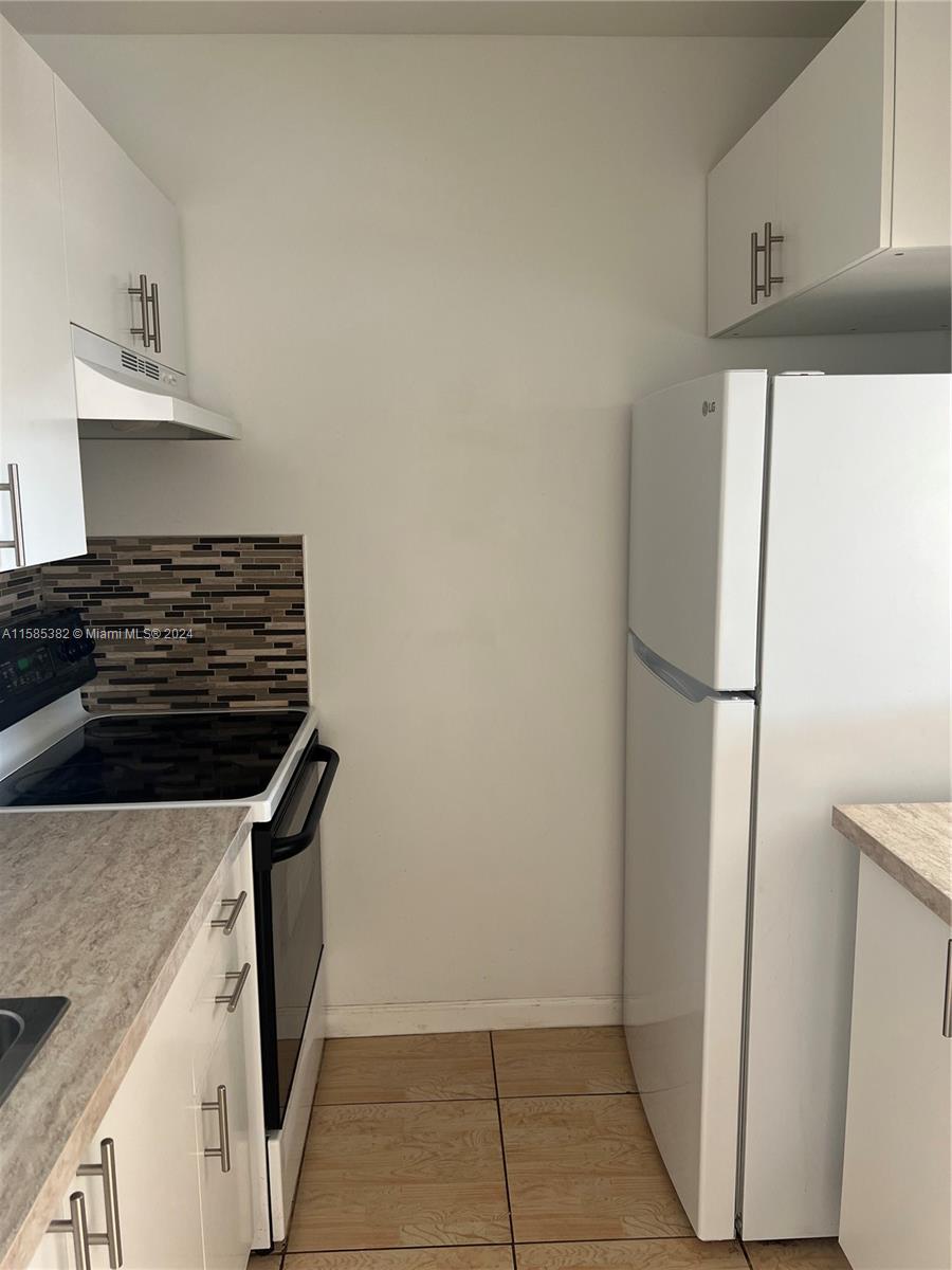 ENVOY APARTMENTS CONDOMIN - Residential Lease
