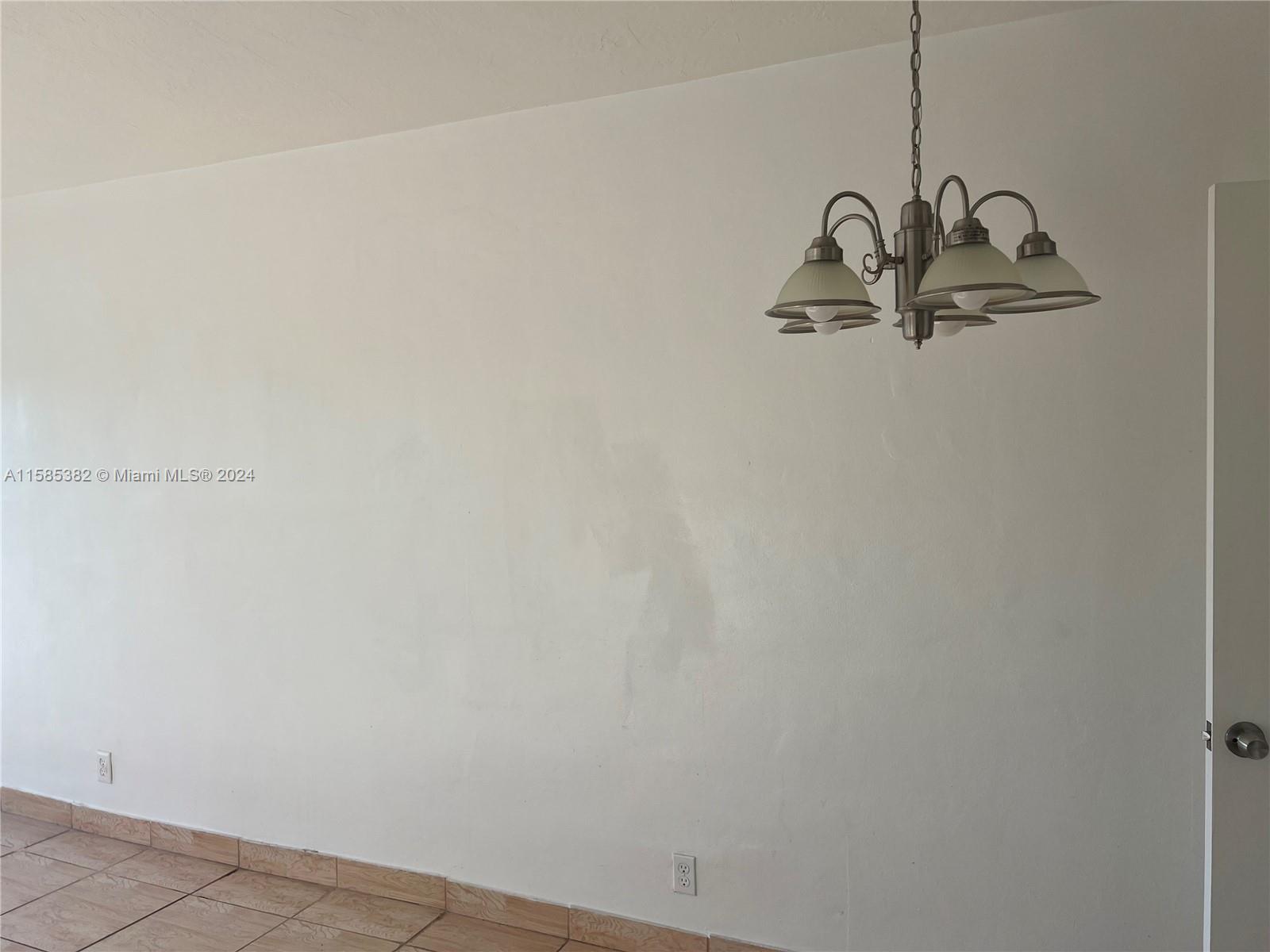 ENVOY APARTMENTS CONDOMIN - Residential Lease