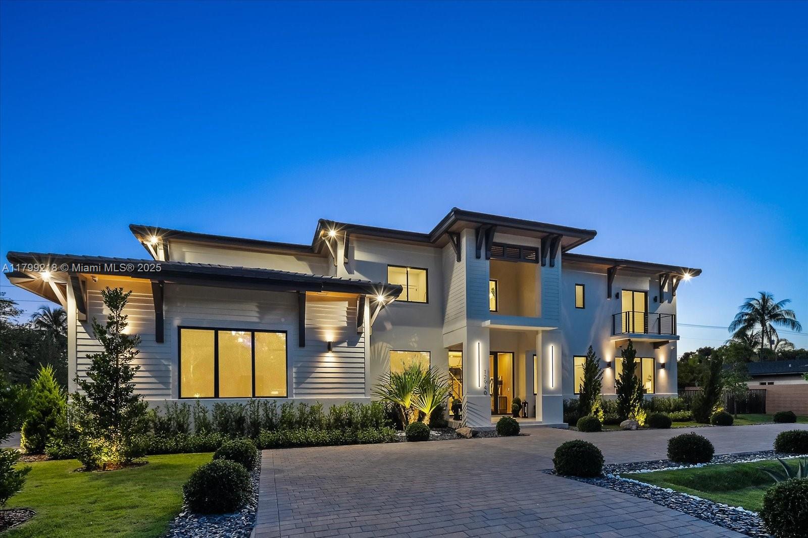 Discover unbeatable value with Pinecrest's lowest-priced new construction home, offering modern luxury & exceptional quality at an incredible price *Meticulously landscaped corner lot *Elegant foyer leading to an open-concept living area w/25 ft ceilings & stunning pool views *Dazzling floor-to-ceiling porcelain stone wall *Full wet bar for effortless entertaining *Chef’s dream kitchen & spacious butler’s pantry* Versatile floor plan, 2 flex rms & loft area* Upstairs main suite, your retreat! * Full summer kitchen* Spacious laundry, generator-ready w/transfer switch & 1000-gallon buried gas tank, wired for smart shades, speakers & cameras, plus Cat-6 wired for all AI upgrades* Don't miss this rare opportunity to own a brand-new home in one of South Florida's most sought-after communities!