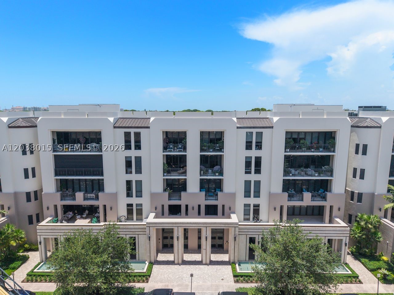 Experience refined living at Biltmore Parc, one of Coral Gables' premier luxury boutique residences. This impeccably appointed two-bedroom, two-and-one-half-bath residence spans approximately 2,117 square feet and has been tastefully curated by a designer, blending sophistication, comfort, and timeless style.

Designed for effortless living and entertaining, the residence features a gracious open-concept grand room, a dedicated dining area, and an expansive private terrace ideal for al fresco dining and gatherings. Floor-to-ceiling windows and doors flood the home with natural light and enhance the spacious feel throughout.

The custom kitchen is beautifully appointed with premium stainless-steel appliances, sleek cabinetry, and refined finishes. Rich wood flooring and designer details are showcased throughout. The spa-inspired primary suite offers a generous walk-in closet and an elegant bathroom featuring a soaking tub, separate shower, and luxurious finishes.

Additional highlights include a walk-in laundry room, private elevator access directly to the residence, and two assigned parking spaces.

Residents enjoy 24-hour concierge service and thoughtfully designed lounge spaces, all within walking distance of Miracle Mile, fine dining, boutique shopping, and the vibrant Coral Gables business district.

A rare opportunity to enjoy luxury, convenience, and exceptional design in one of South Florida's most desirable neighborhoods.