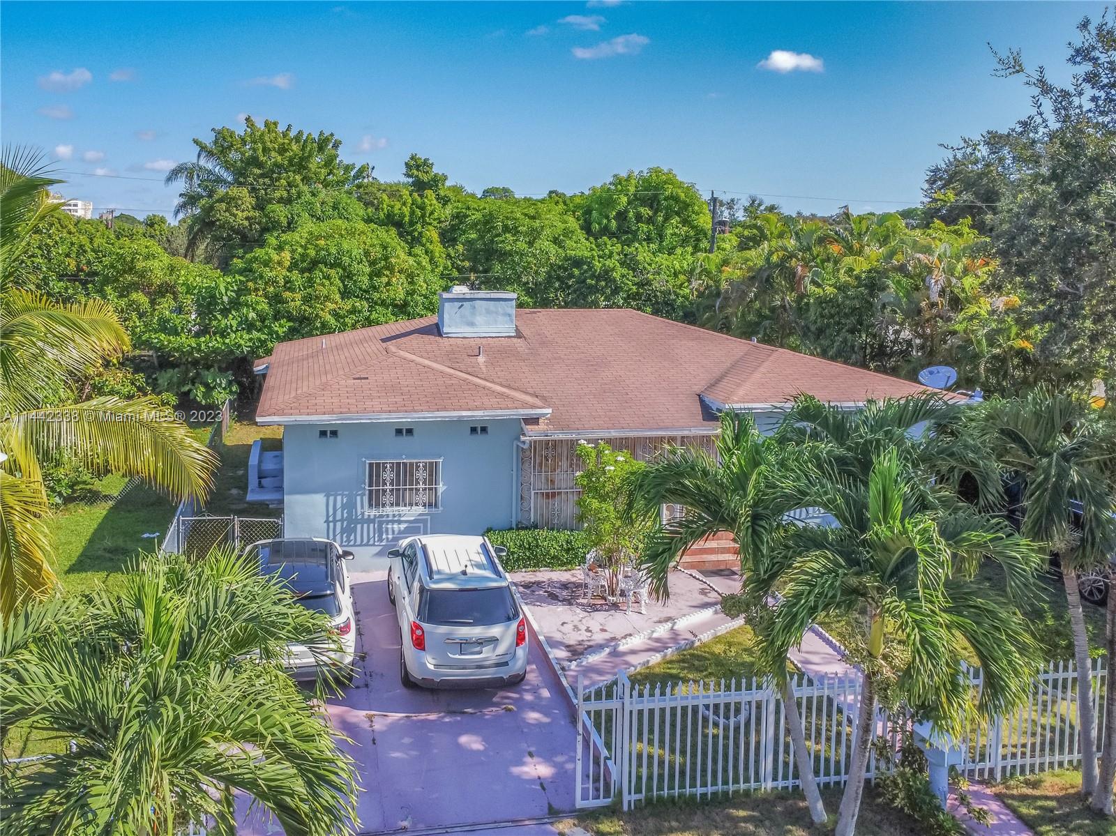 PRIME LOCATION - BACK ON MARKET!! Located in the Brentwood subdivision right off of the prestigious 2nd ave.  Right next to the Art Deco District, Midtown and Wynwood - PERFECT INVESTMENT PROPERTY to flip or AirBnB .  Minutes from shopping, dining and more.  15min to  Airport, the new soccer stadium “Miami Freedom Park”. Homes in this area are selling over $1,000,000.  This home features over 1600 sq ft of living space. 3 beds, 2 bath, fireplace, a converted garage, as well as an enclosed front porch and enclosed lanai (currently used as another bedroom / bonus room).  This home has GREAT POTENTIAL and RETURN!!  The back yard has fruit trees and room for a pool.  Only one owner! Easy access to expressways. Newer tankless hot water tank and AC, new electrical panel. SOLD AS-IS.