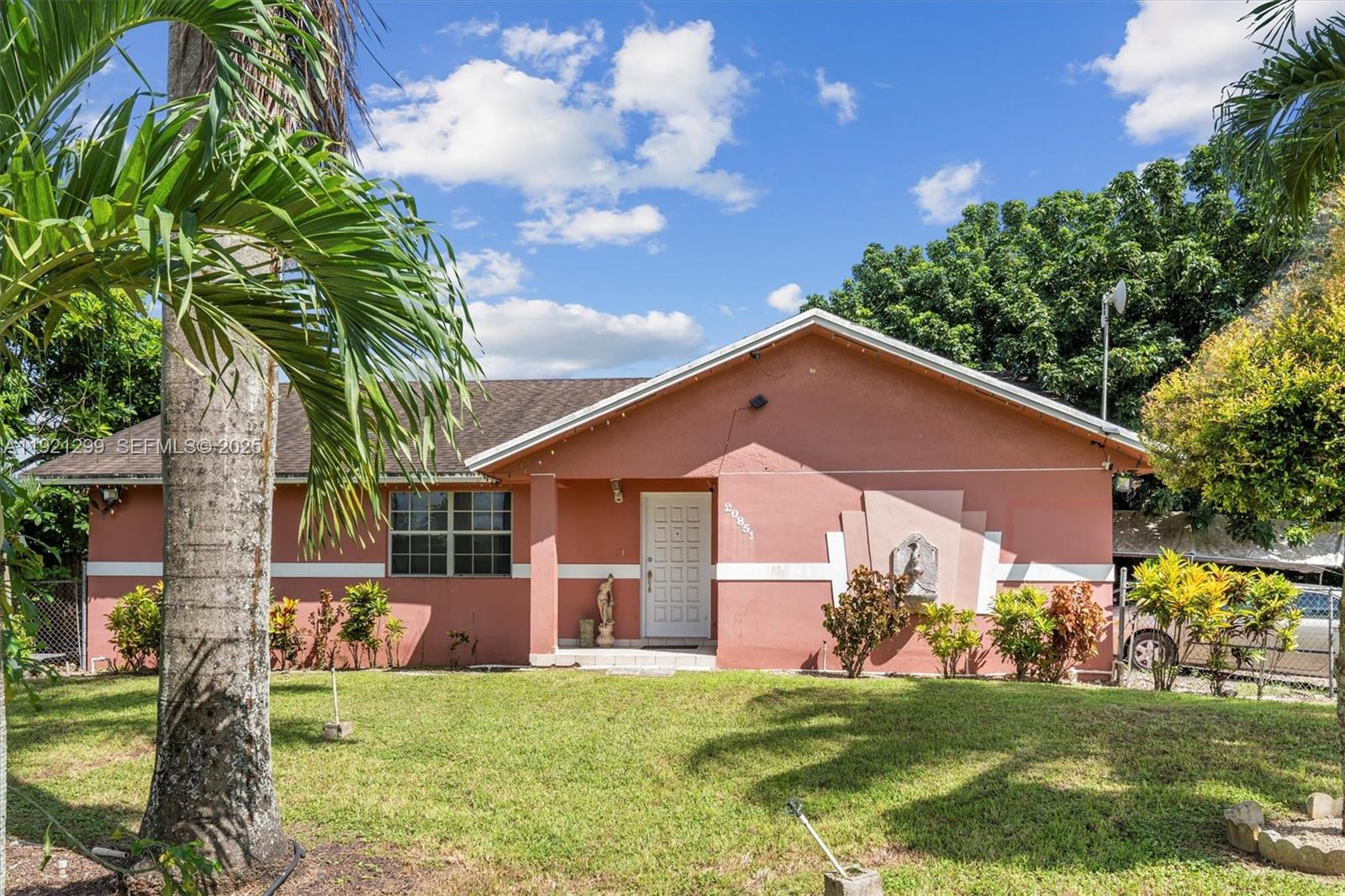 Unique opportunity to own a 1.25-acre property in the desirable Redlands area. The main home offers 4
 bedrooms, 2 bathrooms, and even includes a bunker for when there is a strong hurricane. In addition, there is a separate 2-bedroom, 1-bath house which could be an in-law's quarters; a manufactured home with 4 bedrooms and 2 bathrooms; plus 2 trailers on site. This property is currently generating monthly income with the potential to increase further. Perfect for an investor seeking strong cash flow or an end-user who wants to enjoy the peaceful lifestyle of the Redlands while benefiting from an income-producing property. Ample space for parking, outdoor living, and future improvements such as a pool, etc. A rare find combining rural charm, multiple residences, and consistent income potential. Must see! Please call listing agent for showing.