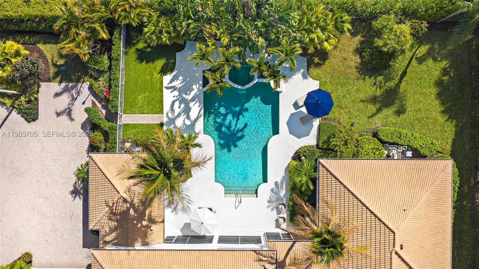 Located on a large lot on the east side of Admirals Cove, this home offers a rare combination of space, privacy, and a full golf membership. Tasteful updates have been made throughout, and the first-floor primary suite provides comfort and convenience with easy access to the main living areas. The oversized lot provides generous outdoor space with a large pool and expansive backyard ideal for relaxing or entertaining. A detached guest house offers private accommodations for visitors, making this property particularly unique. The spacious outdoor areas provide plenty of room to enjoy the Florida sunshine, host gatherings by the pool, or unwind in a private backyard setting.

Admirals Cove is one of Jupiter's most sought-after private communities, offering 45 holes of championship golf, two clubhouses, two driving ranges, a world-class marina with direct ocean access, a state-of-the-art fitness center, tennis and pickleball courts, multiple dining venues, and a full calendar of social and recreational activities.