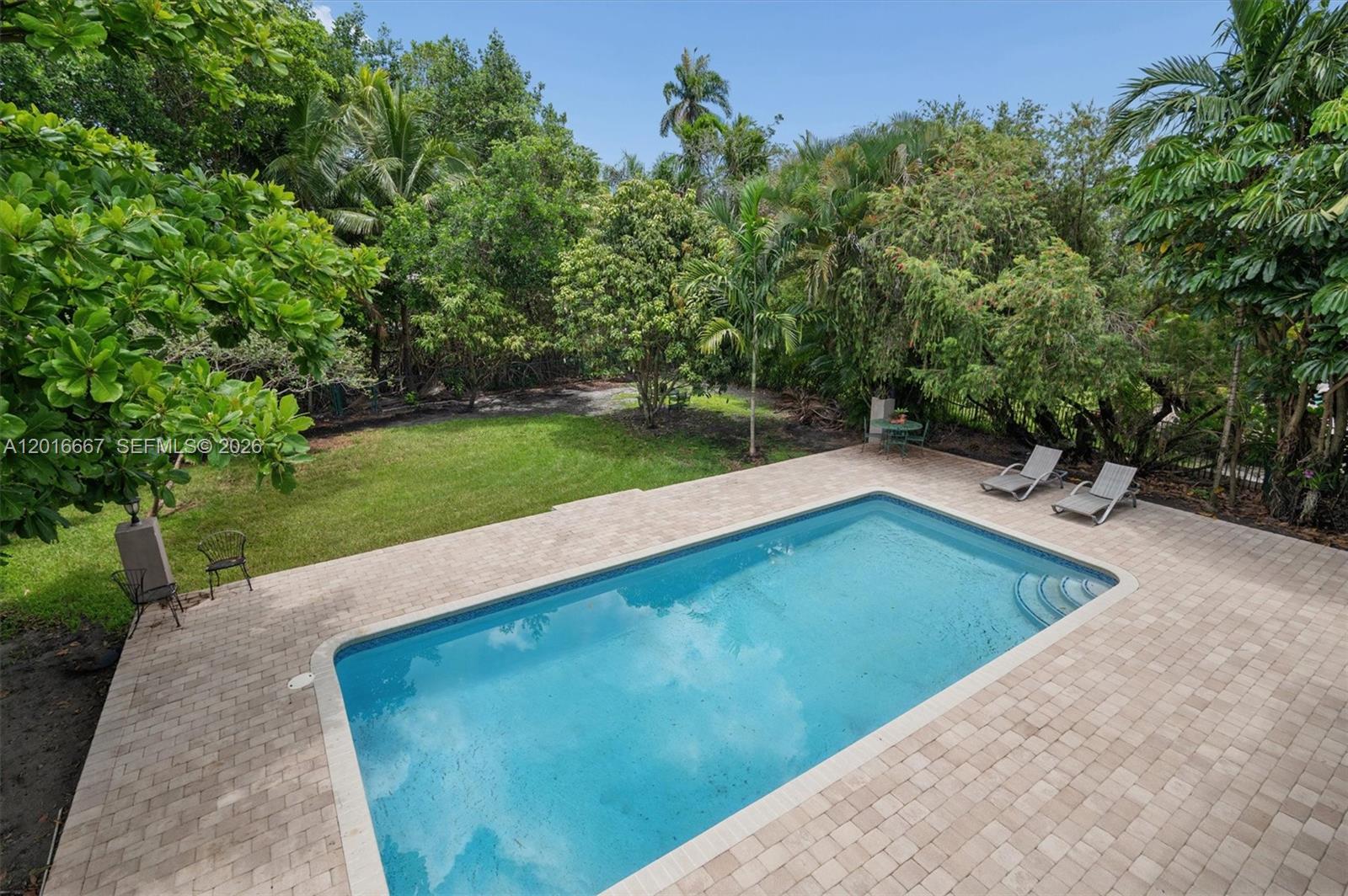 BEAUTIFUL LARGE SIX BEDROOM POOL HOME WITH PRIVACY FROM THE OLETA RIVER CANAL BEHIND THE PROPERTY. SOOOO CLOSE TO EVERYTHING - BLOCKS AWAY FROM AVENTURA, SHOPPING, FANTASTIC PUBLIC AND PRIVATE SCHOOLS, AND PARKS. EASY ACCESS TO I-95, US 1/BISCAYNE BLVD, IVES DAIRY & MIAMI GARDENS DRIVE. LOCATED HALF WAY BETWEEN FLL AND MIA AIRPORTS AND SEA PORTS - EASY TO GET TO DOWNTOWN FT LAUDERDALE OR MIAMI. FEW MILES FROM THE BEACHES, STADIUM, GULFSTREAM, AND HARD ROCK - LOCATION MAKES COMMUTE, LIFE, AND LIVING A BREEZE! TERRIFIC PUBLIC SCHOOL K THRU 8TH GRADE CLOSE ENOUGH TO WALK. OFF DUTY FLORIDA HIGHWAY PATROL OFFICER ON DUTY 24/7/365 AS ROVER FOR THIS NEIGHBORHOOD AND OAK FOREST ONLY.

WONDERFULLY LARGE OPEN KITCHEN/DINING ROOM COMBINATION JUST OFF OF THE FAMILY ROOM. FOUR FULL BEDROOMS DOWNSTAIRS WITH THE PRIMARY BEDROOM UPSTAIRS. GIGANTIC LIVING ROOM IS SO BRIGHT AND PRIVATE WITH WINDOWS TO THE OUTDOOR ATRIUM. SPECTACULAR HOME FOR ENTERTAINING BOTH INDOORS AND OUTSIDE WITH LARGE COVERED PATIO, POOL, AND YARD. 

OLETA RIVER CANAL PROVIDES EXTRA PRIVACY, AMBIANCE, AND CASUAL VIBE PERFECT FOR BBQ'S, POOL PARTIES, AND GATHERINGS OF YOUR FAMILY AND FRIENDS!