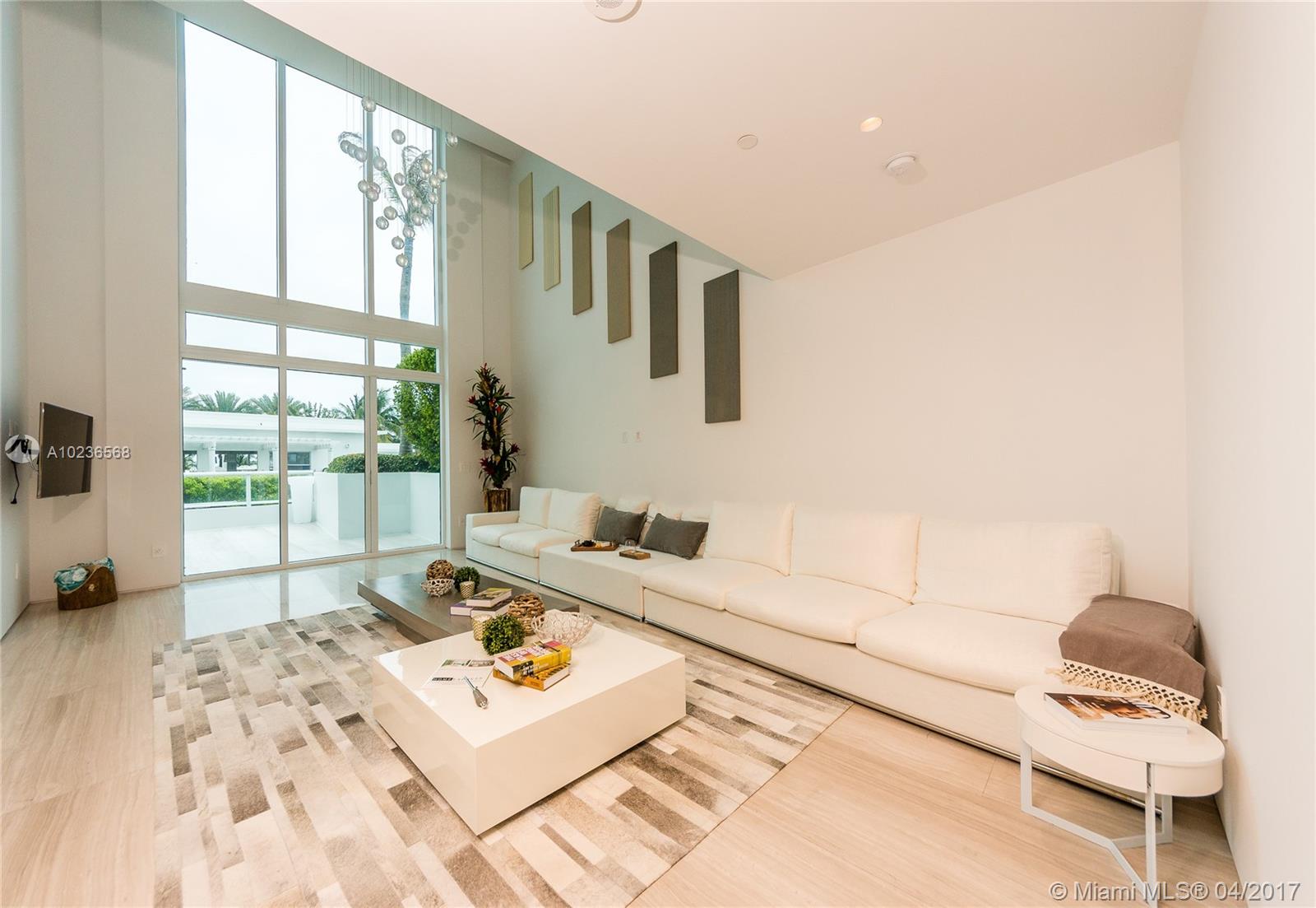A unique and rare opportunity to own a totally new complete high-end modern renovated multi-level oceanfront townhome at coveted Continuum South. Generous living space, and 2 large outdoor terraces offer abundant outdoor entertaining space and beautiful ocean & bay views. Continuum's luxury amenities include an exclusive full-service beach club, 2 lagoon-style pools, 3 pro Har-Tru tennis courts, multi-level world class fitness center and spa, private patio restaurant, 24hr security, concierge, & valet!