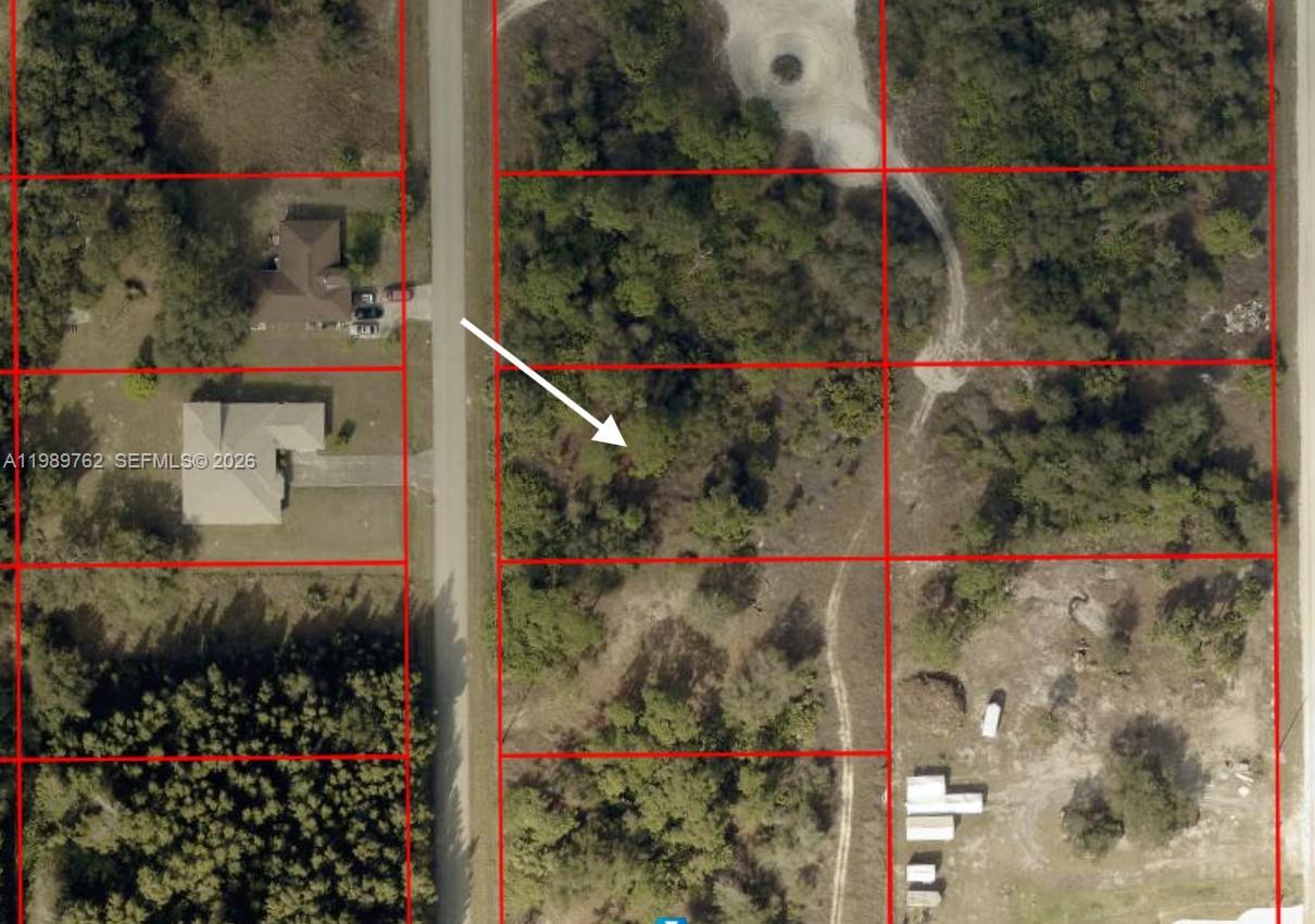 Situated in an X FLOOD ZONE, offering added flexibility for future development. Half-acre vacant lot located in a quiet neighborhood with paved road access. Ideal opportunity to build your dream home or invest in land. Buyer to perform all due diligence to verify zoning, utilities, and suitability for intended use.