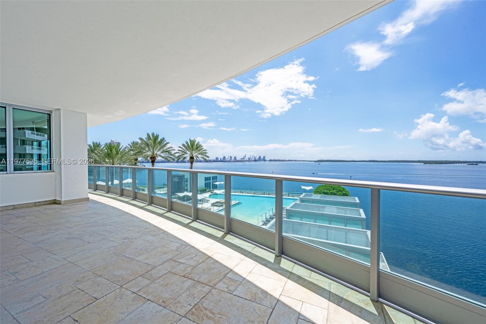 Breathtaking bay views in this spacious 2 bed/2 and half bath. Marble floors all through-out, One of the best lines in the building.