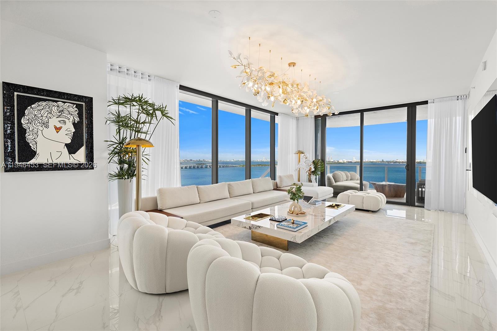 Brand-new 2025 construction at Aria Reserve — Miami’s tallest waterfront residential twin towers and one of the most acclaimed luxury developments in the country. This stunning 4-bedroom + formal dining room, 5.5-bath flow-through residence offers 2,530 SF of meticulously designed interior space plus a 300 SF open terrace, with sweeping, unobstructed Biscayne Bay views and coveted sunrise and sunset exposures.
The unit arrives with an exclusive private elevator landing and dedicated foyer entry — a rare touch of true residential privacy within a high-rise setting. Floor-to-ceiling glass throughout floods every room with natural light and frames the water views as living art. The interiors have been professionally designed and furnished in an elegant, contemporary aesthetic, delivering a turnkey luxury experience with nothing left to do but arrive.
Resort-style amenities include a heated pool and spa, state-of-the-art fitness and yoga studios, tennis and pickleball courts, a watersports marina, bayfront restaurant and café, Sky Lounge, concierge, valet, and 24-hour attended lobby. In-unit washer/dryer and one assigned garage space included.
Located in Edgewater, one of Miami’s most sought-after waterfront neighborhoods — minutes from the Design District, Wynwood, Downtown Miami, Brickell, and the Venetian Causeway to South Beach.
Available for seasonal and short-term rentals; pricing varies by dates — contact listing agent for availability.