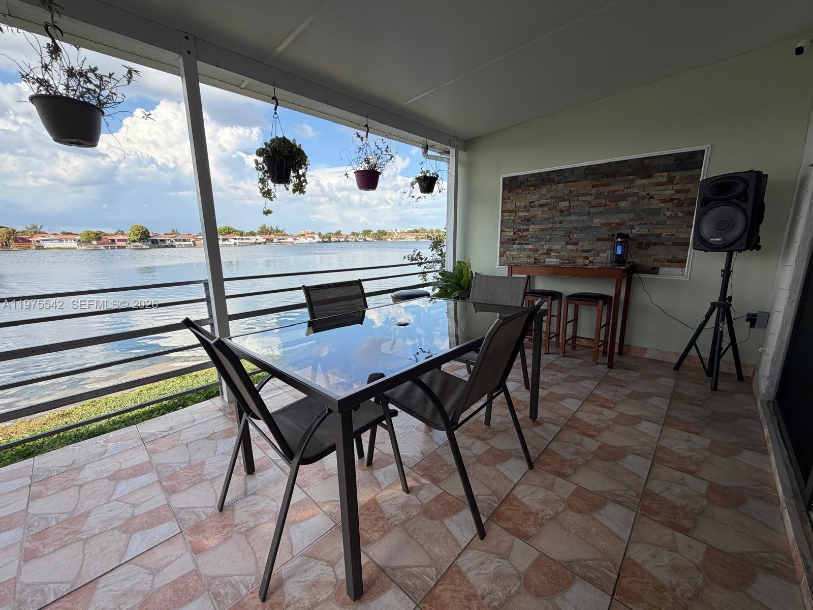 Furnished, Beautiful and spacious  4 bed 3 bath town house at the highly desirable gated community Lago Grande in Hialeah, 100% remodeled like new, 1784 sf living space, stunning lake view terrace perfect for relaxing or  entertaining, with family and friends. Washer & Dryer, community pool. Close to everything, centrally located. Access to every where. Call Listing Agent