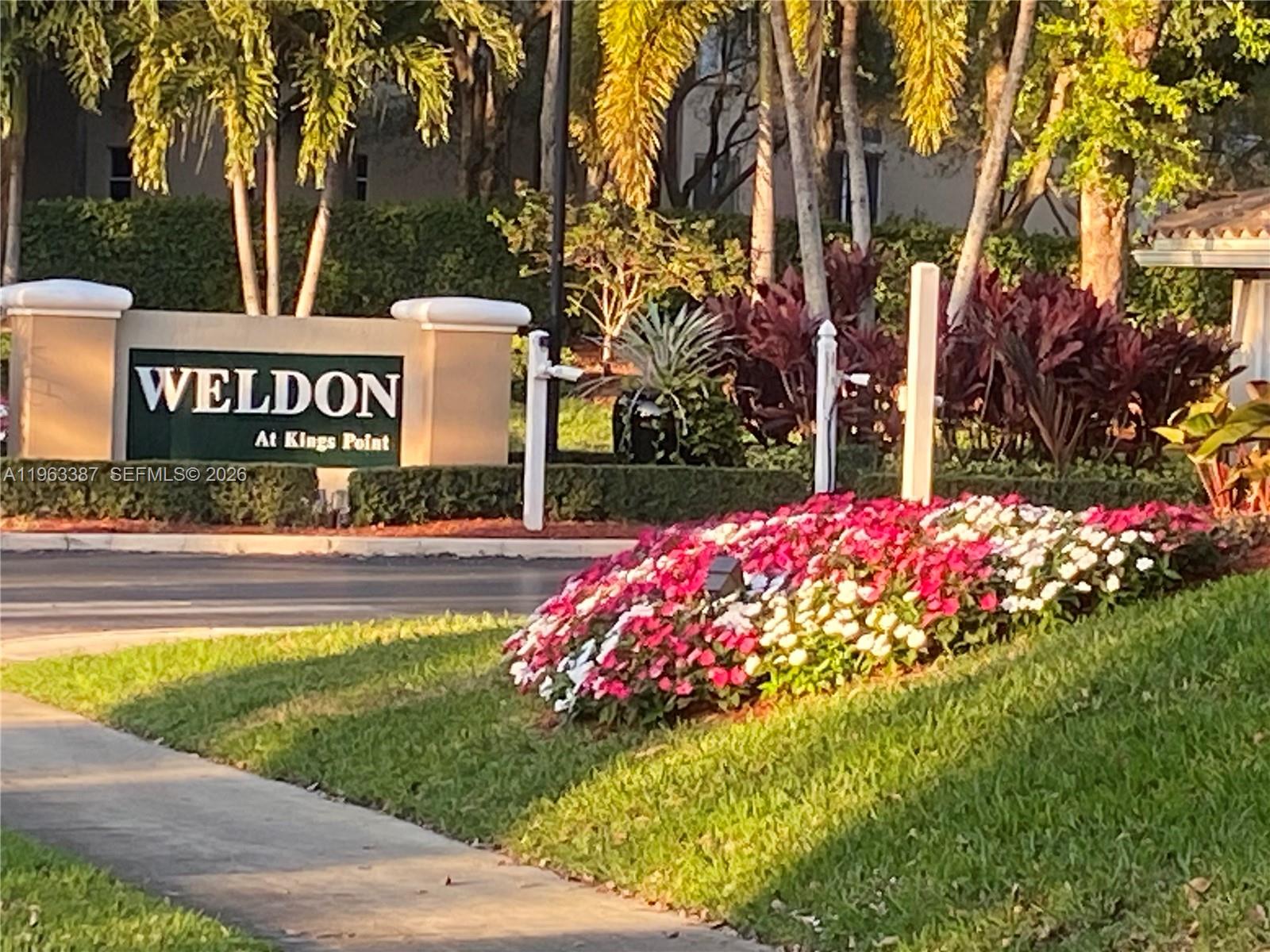 Beautifully maintained unit located in the desirable Weldon community within Kings Point. This spacious residence features an open floor plan, generous primary suite, ample closet space, and screened balcony ideal for enjoying peaceful water/garden views. Active 55+ community offering resort-style amenities including clubhouse, theater, indoor/outdoor pools, fitness center, courtesy bus, and more. Conveniently located near shopping, dining, and major roadways. Association approval required.