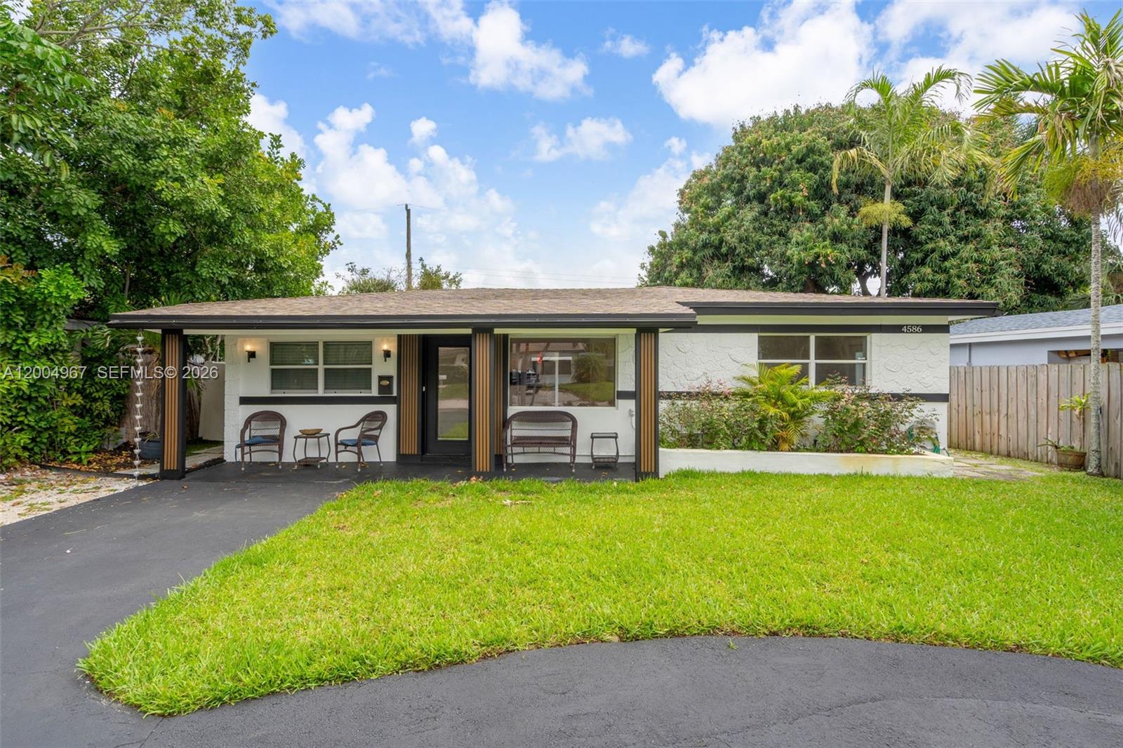 Beautifully upgraded 4 bed, 3 bath home in a great, central location with no HOA. Bright, open layout with wood-look tile flooring and a modern kitchen featuring granite countertops, updated cabinetry, and stainless steel appliances. Private in-law suite with separate entrance, full bath, and kitchenette. Impact windows and doors, fenced backyard, and close to beaches, shopping, dining, and major highways. No rental restrictions, making it a strong Airbnb or short-term rental opportunity!
