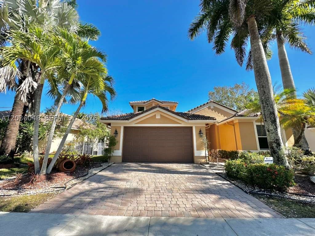 Located in the exclusive Weston Hills Country Club, this freshly painted 2-story residence offers an open floor design with 3,490 SF of living space featuring 6 bedrooms, 4.5 baths, and a 2-car garage. Enjoy stylish laminate and ceramic flooring throughout and a layout designed for comfortable everyday living and entertaining. Set on an 8,378 SF lot inside a gated golf course country club community, and zoned for A+ schools. Best-priced opportunity to own and personalize a spacious home in one of Weston’s most desirable communities.