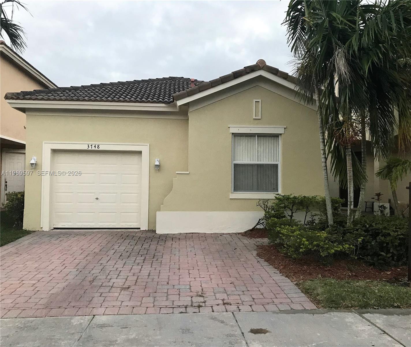 Welcome to this beautifully maintained home in the heart of Homestead! This property offers comfortable living with an open layout, abundant natural light, and good bedroom sizes in a gated community. The kitchen is perfect for entertaining, flowing seamlessly into the main living areas. Enjoy the pond view for relaxing in the evenings. Conveniently located near major highways, shopping, dining, schools, and Baptist Health. Low HOA and great community atmosphere. Whether you're a first-time buyer or looking to upgrade, this home is move-in ready and priced to sell. Schedule your private showing today!