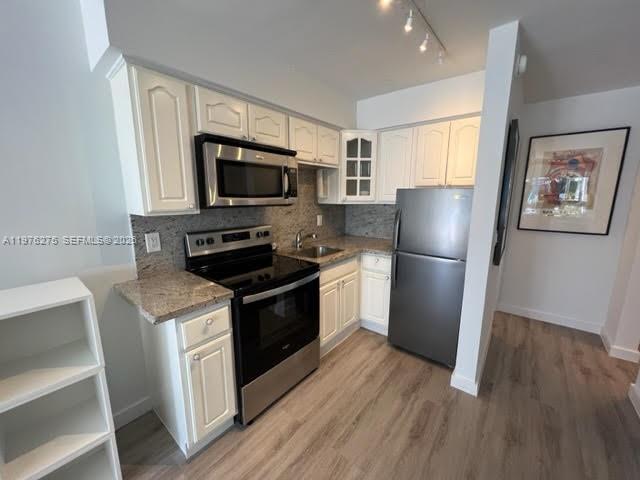 FRENCH LEAVE WEST CONDO - Residential
