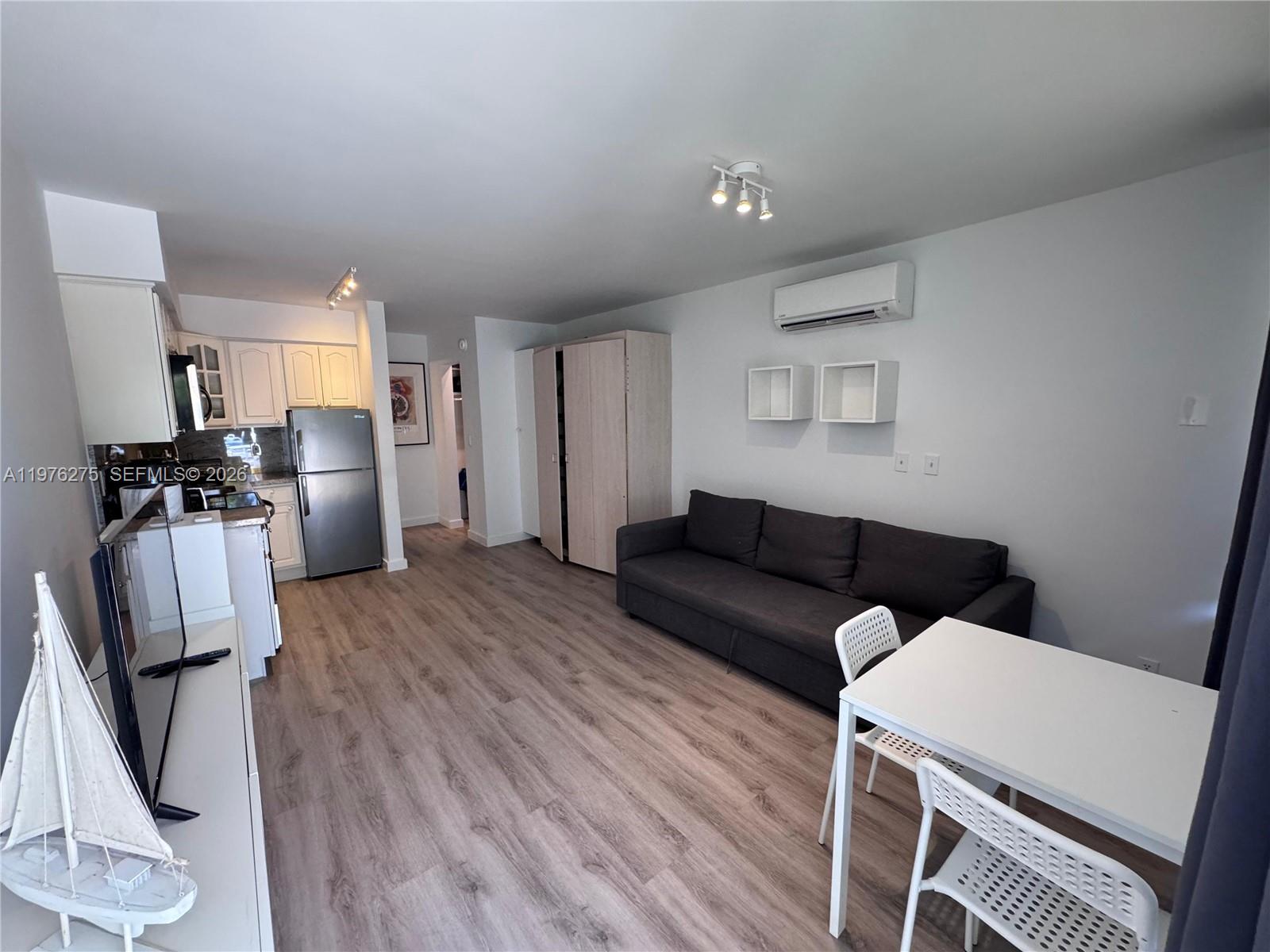 Location, Location, Location!!! Enjoy coastal living at its finest in this beautifully updated studio apartment, ideally located just steps from the ocean. Featuring new vinyl floors and a new mini split AC system, along with impact windows and doors that provide privacy, comfort, and peace of mind. The unit opens directly onto a spacious patio area with a tiki hut and partial ocean views, perfect for relaxing or entertaining guests. This well-maintained complex offers a large pool and sun deck, outdoor barbecue and bar area, and charming patio spaces throughout the property. Offered fully furnished, this turnkey unit is ready for immediate enjoyment or investment. Tenant occupied until January 31, 2027 paying $1,700/month. Unit can be rented up to 5 times per year with a minimum of 30 days after the first year of ownership. Condo rental rules and regulations attached.