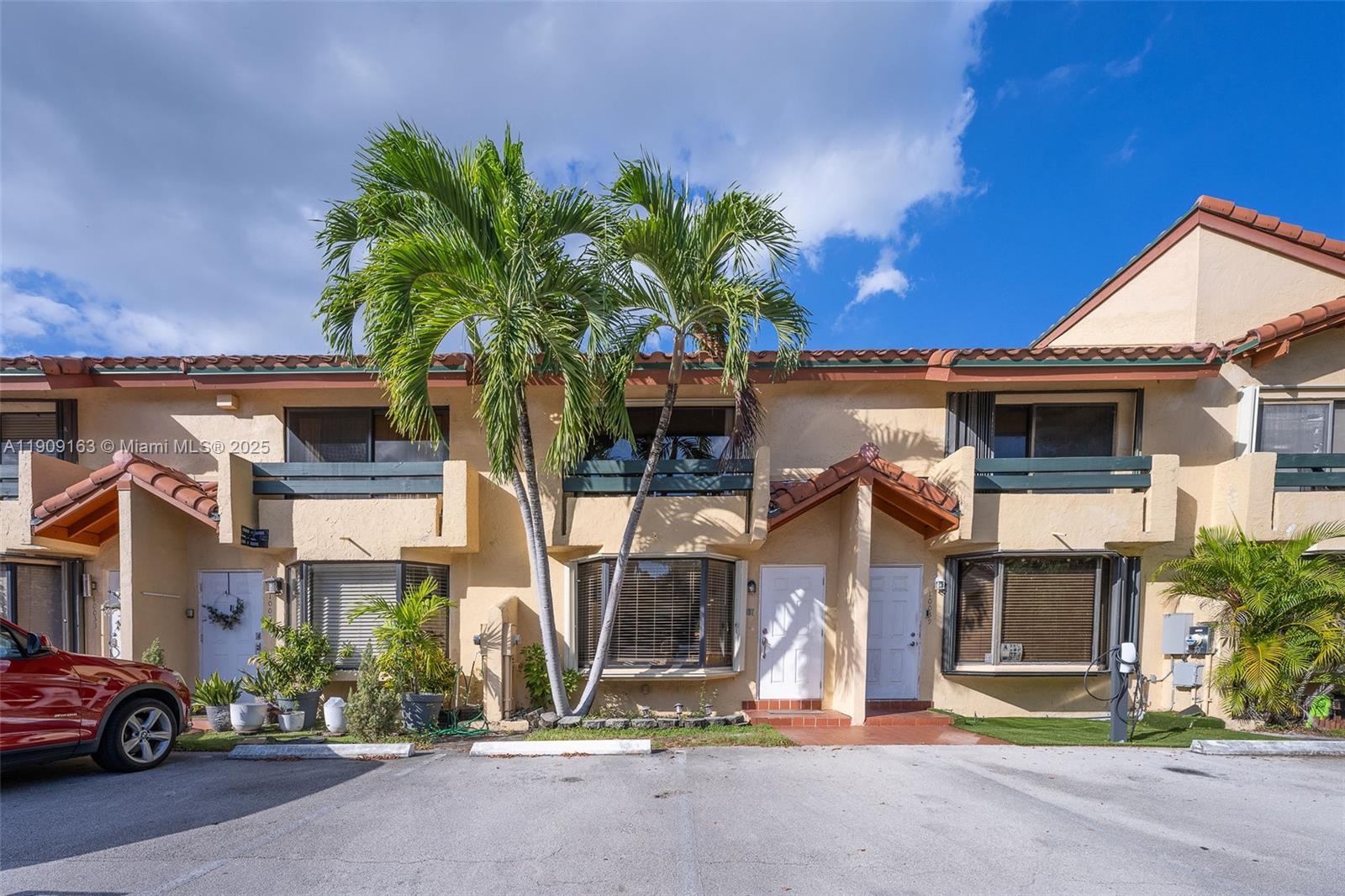 Welcome to this charming townhome in the highly desirable and central Dadeland Cove. Nestled in a private cul-de-sac, this immaculate, two-story townhome features: bay windows; gorgeous, tile floors throughout; a wood staircase; a beautiful kitchen with stainless steel appliances and quartz countertops; LG washer/dryer; TV in the kitchen; half bath downstairs; large, marble bath with combination tub/shower upstairs; large master suite with wall-to-wall closet and private alcove; upgraded closet doors throughout; black-out drapes in the bedrooms; accordion + panel shutters; recessed lighting; tiled patio (with ambient lighting); two, assigned parking spaces directly in front of the unit + visitor parking; and no backdoor neighbors. The unit is walking distance to the beautiful pool area.