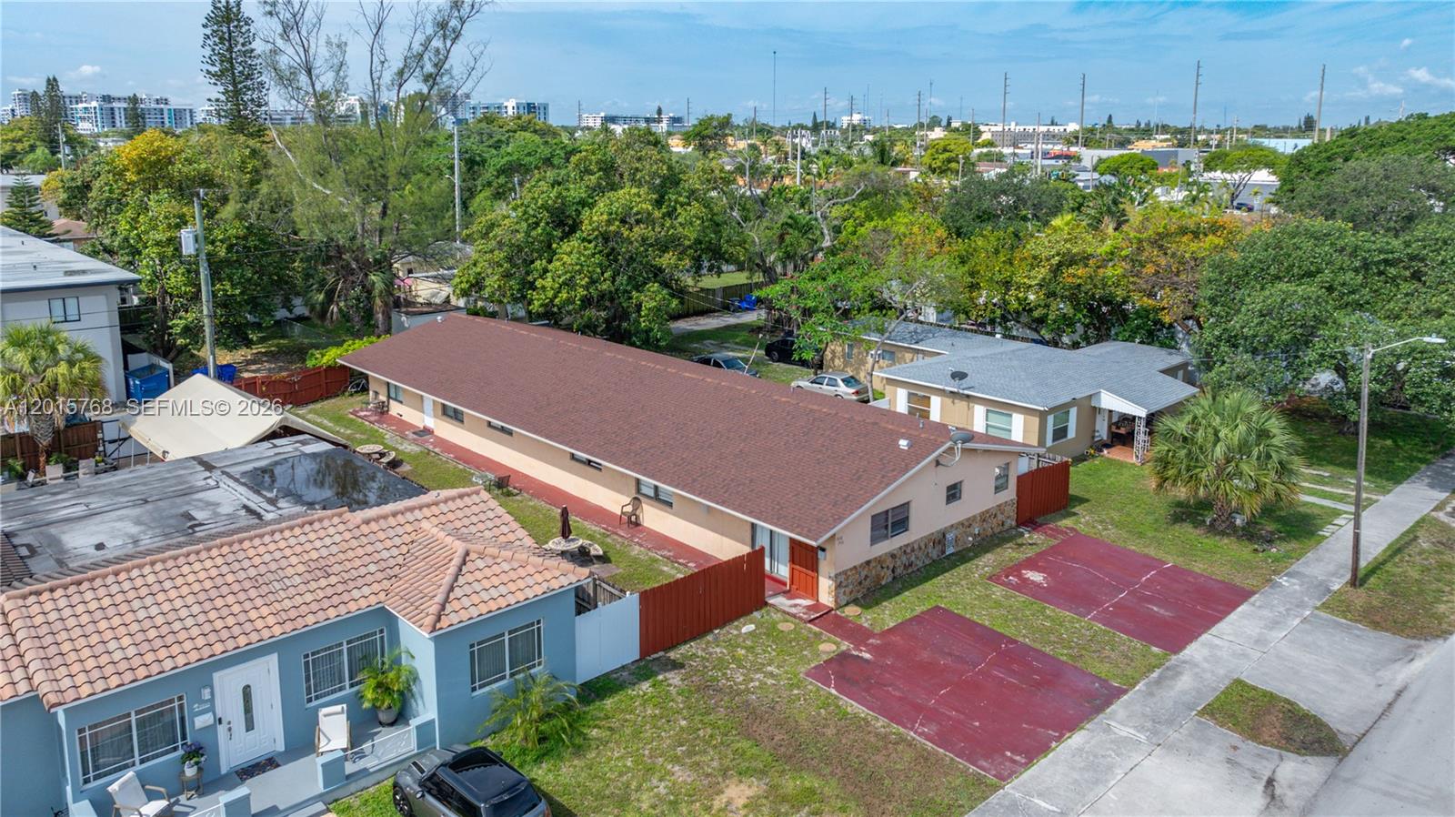 Large duplex opportunity in the heart of east Hollywood near shopping, dining, parks, transportation, and everyday conveniences. Spacious 7-bedroom income-producing property with strong rental potential and value-add opportunity for investors. Property features two electric meters and may benefit from updates and renovations, offering the chance to improve value and maximize income potential. Tenant occupied on month-to-month basis. Please do not disturb tenants. Showings by appointment only.
