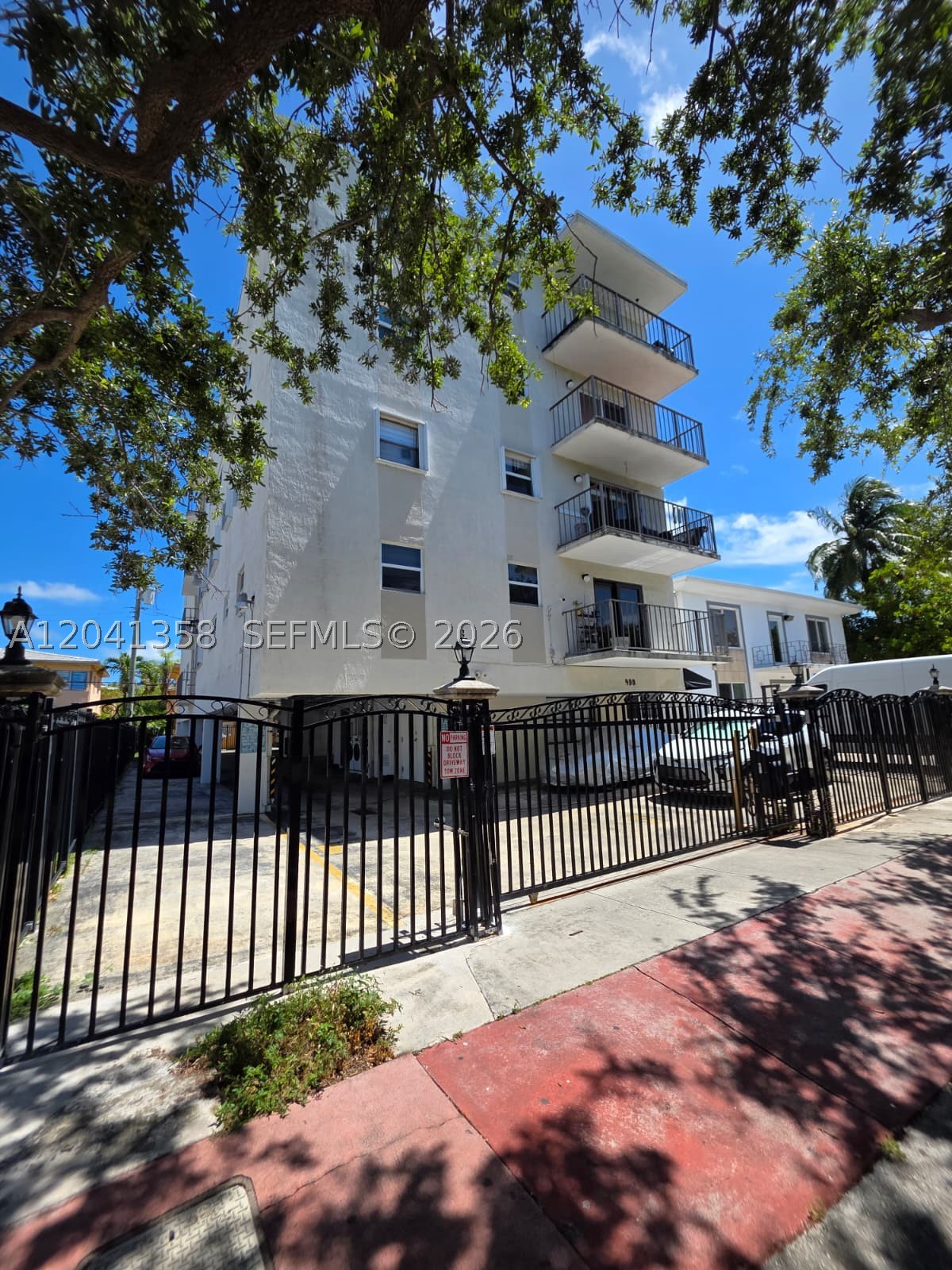 Welcome to this bright and spacious 2-bedroom, 2-bathroom condo offering 990 square feet of comfortable living in the desirable Sun Isle community on Miami Beach's Isle of Normandy. This top-floor unit features an expansive open-concept living and dining area finished with large neutral tile flooring throughout and bathed in natural light, opening to a private screened balcony perfect for morning coffee or evening relaxation. The functional kitchen offers granite countertops, ample wood cabinetry, and a sunny window above the sink. Both bedrooms are generously sized with abundant closet space, including a walk-in closet, and the unit's two full bathrooms add everyday convenience and flexibility for family or guests. A dedicated dining room rounds out a layout that lives comfortably and makes the most of every square foot. Gated parking provides added security and peace of mind. Ideally located just minutes from Normandy Isle Park, the golf course, Normandy Fountain's shops and restaurants, and a short drive to the sand and surf of Miami Beach. Whether you're seeking a primary residence, a vacation getaway, or a smart investment opportunity, this well-maintained 1982 condo delivers authentic Miami Beach island living at an accessible price point. Schedule your private showing today!