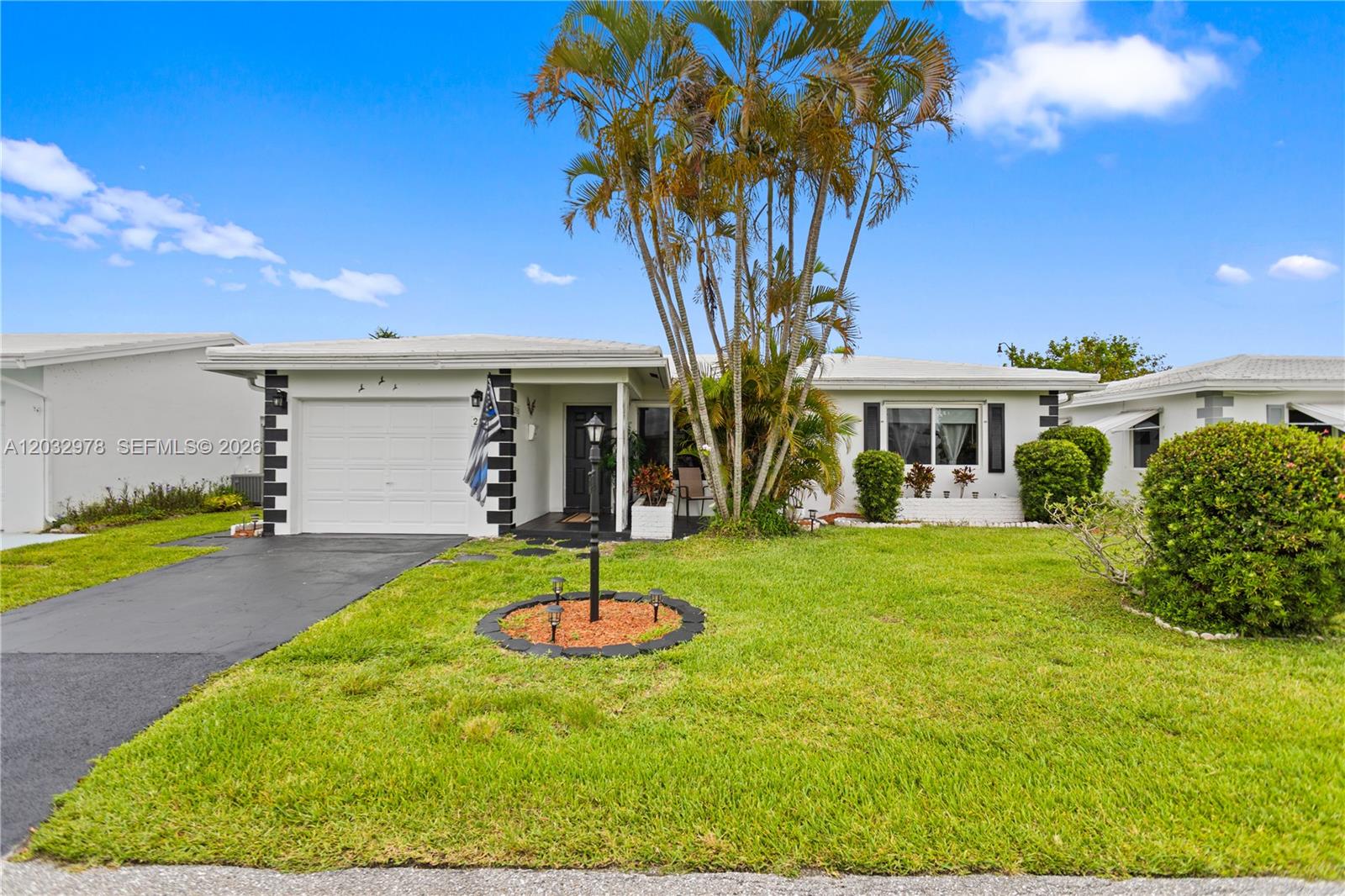 Beautifully maintained 2-bedroom, 2-bath home offering approximately 1,712 sq ft under air. Numerous updates throughout, including a newer water heater, updated bathrooms and kitchen, redone driveway, new garage door opener, upgraded electrical panel and wiring, and impact windows in the front of the home. The A/C is approximately 6 years old and recently serviced. Enjoy a spacious layout, and a community with low HOA fees of just $310/month, which includes exterior painting, lawn maintenance, and annual pressure washing. Conveniently located near shopping, dining, medical facilities, and major roadways.