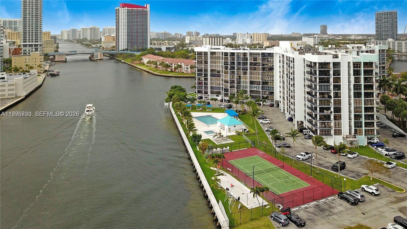 Amazing Waterfront, Resort-Style Living in the Desirable Three Islands Neighborhood!
Welcome to this spacious 2-bedroom, 2 full bath condo in Hallandale Beach, just minutes from Aventura, Gulfstream Park, Seminole Hard Rock Hotel and Fort Lauderdale-Hollywood International Airport, with endless shopping and dining nearby.  This bright and inviting unit features floor-to-ceiling windows in both bedrooms and the living area, filling the space with natural light, along with an open balcony.  The condo offers some tasteful updates, including white kitchen cabinets, quartz countertops, and an updated primary bathroom.  Monthly maintenance includes cable, internet, access to a gym, sauna, tennis courts, 24-hour security, and more, plus the convenience of an on-site management company.  Pet-friendly and ideal as a second home, investment, or your own piece of paradise in sunny South Florida.  Available for purchase in Cash or Financing.  Contact the listing agent for more details.  Priced to sell.