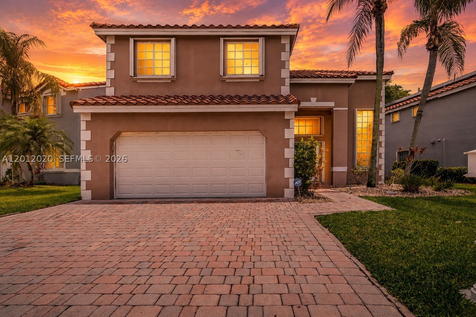 Step into luxury in this highly renovated 4-bedroom, 2.5-bath two-story residence located in one of Weston’s sought-after gated communities. Freshly painted and beautifully redesigned with upscale touches throughout, this stunning home features elegant wood-look tile flooring, high-volume ceilings, designer lighting, and sophisticated modern finishes. The luxurious new chef’s kitchen showcases quartz countertops, custom cabinetry, new stainless-steel appliances, and an open-concept layout perfect for entertaining and everyday living. Spacious formal living and dining areas flow seamlessly into the family room, creating an inviting and refined atmosphere. Upstairs, the oversized bedrooms and spa-inspired renovated bathrooms offer comfort and style, while the primary suite provides a peaceful retreat. Enjoy outdoor living with a beautifully paved patio and hot tub, ideal for relaxing or hosting guests. Additional highlights include a paver driveway, 2-car garage, barrel tile roof, accordion hurricane shutters, low HOA, and walking distance to the community pool and top-rated schools. This move-in-ready home combines elegance, comfort, and the best of Weston living.