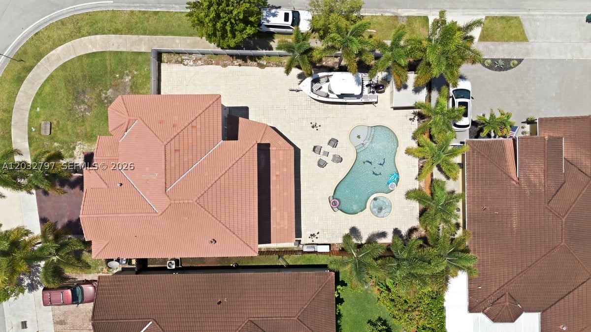 Spacious 6-bedroom, 4-bath corner home in Homestead! This two-story property sits on a generous 7,480 sq. ft. lot and features a brand-new roof for added peace of mind. Enjoy Florida living at its finest with a private pool and jacuzzi, perfect for entertaining family and friends. The converted garage provides additional flexible living space that can be used as a family room, home office, gym, or guest area. The kitchen comes fully equipped with all appliances, including a washer and dryer. Conveniently located near schools, shopping, dining, and major highways, this home offers comfort, space, and endless potential. Don't miss this incredible opportunity!
