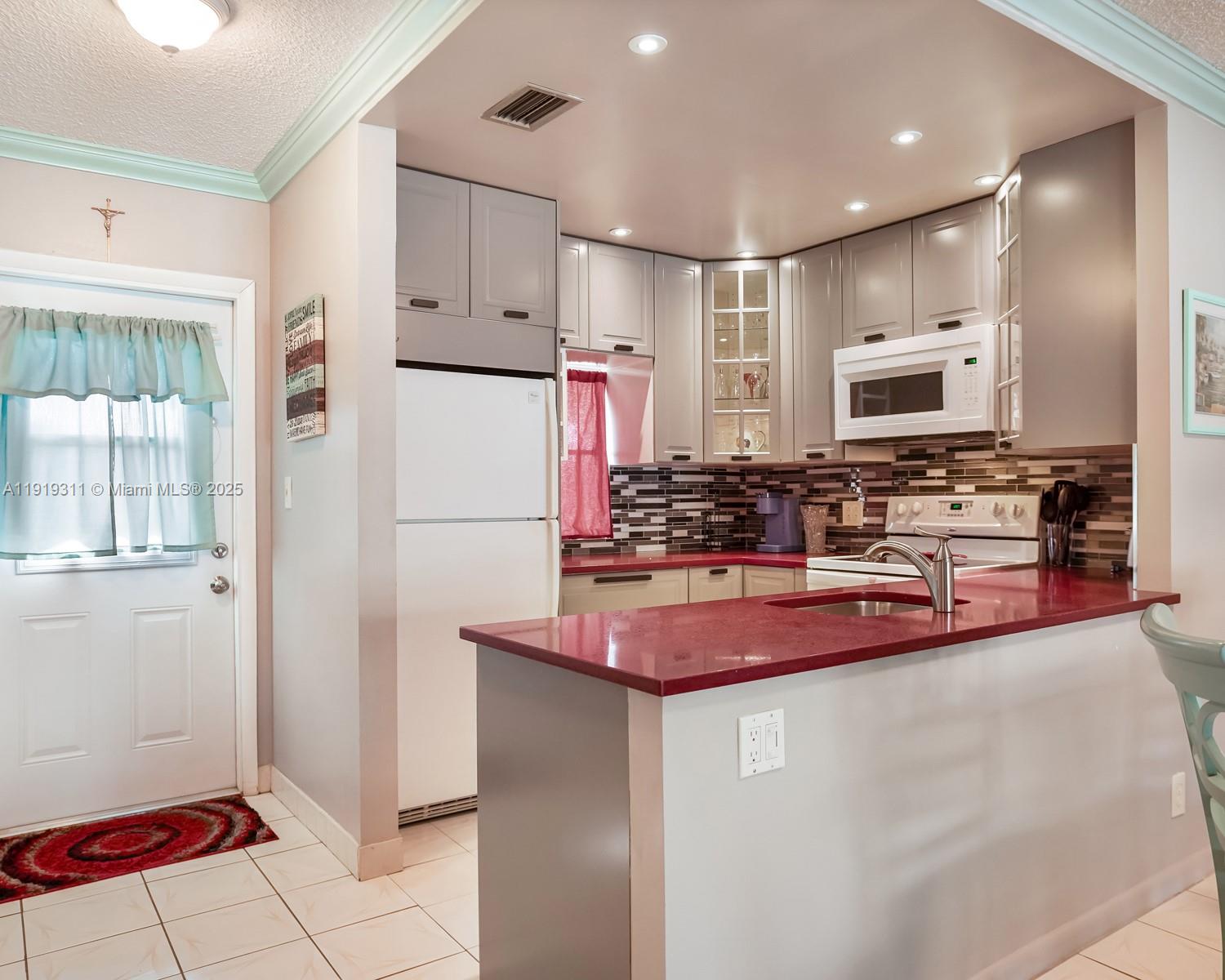 POINCIANA GARDENS CONDO - Residential
